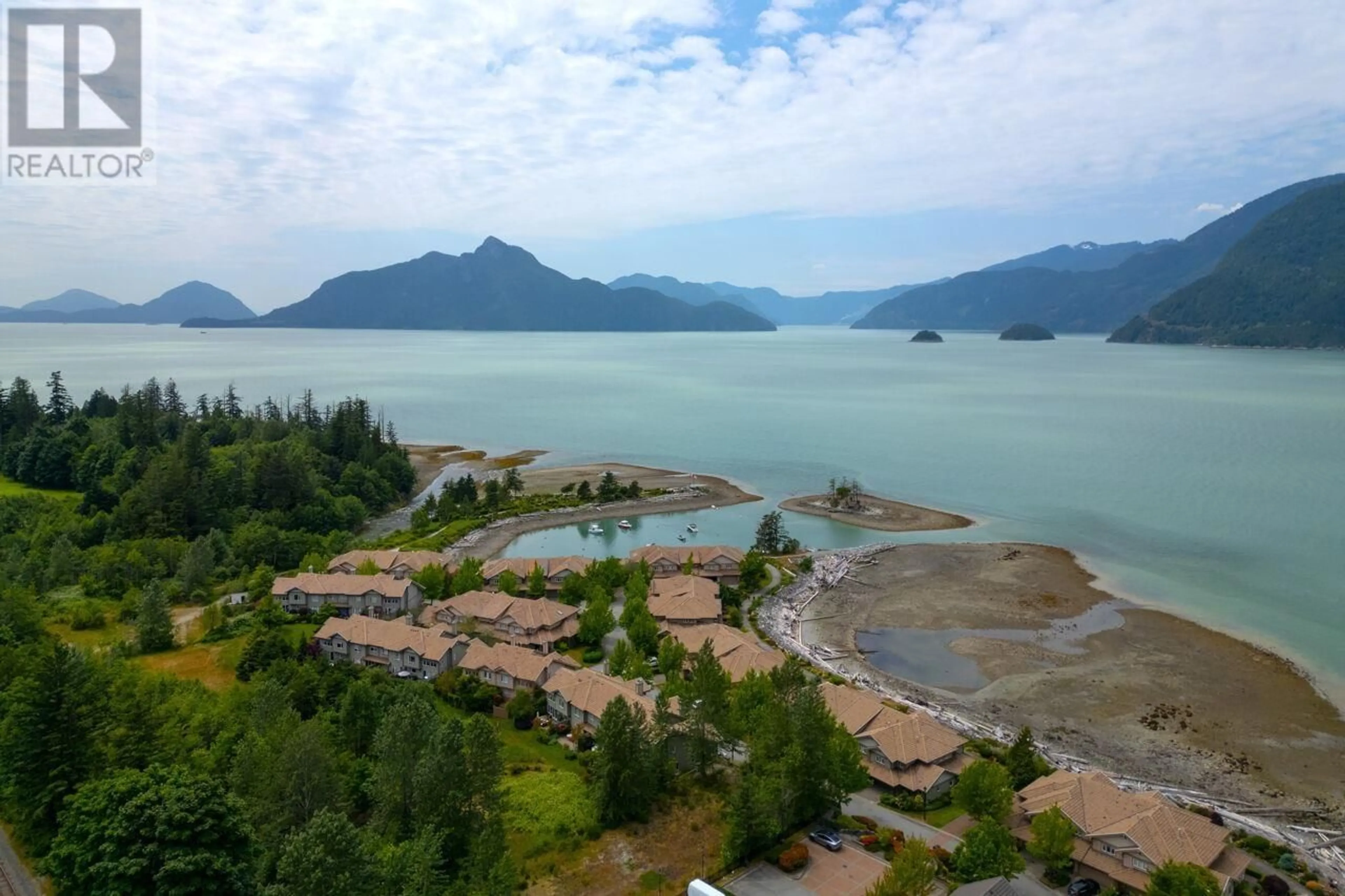 A pic from outside/outdoor area/front of a property/back of a property/a pic from drone, water/lake/river/ocean view for 15 BEACH DRIVE, West Vancouver British Columbia V8B1A2