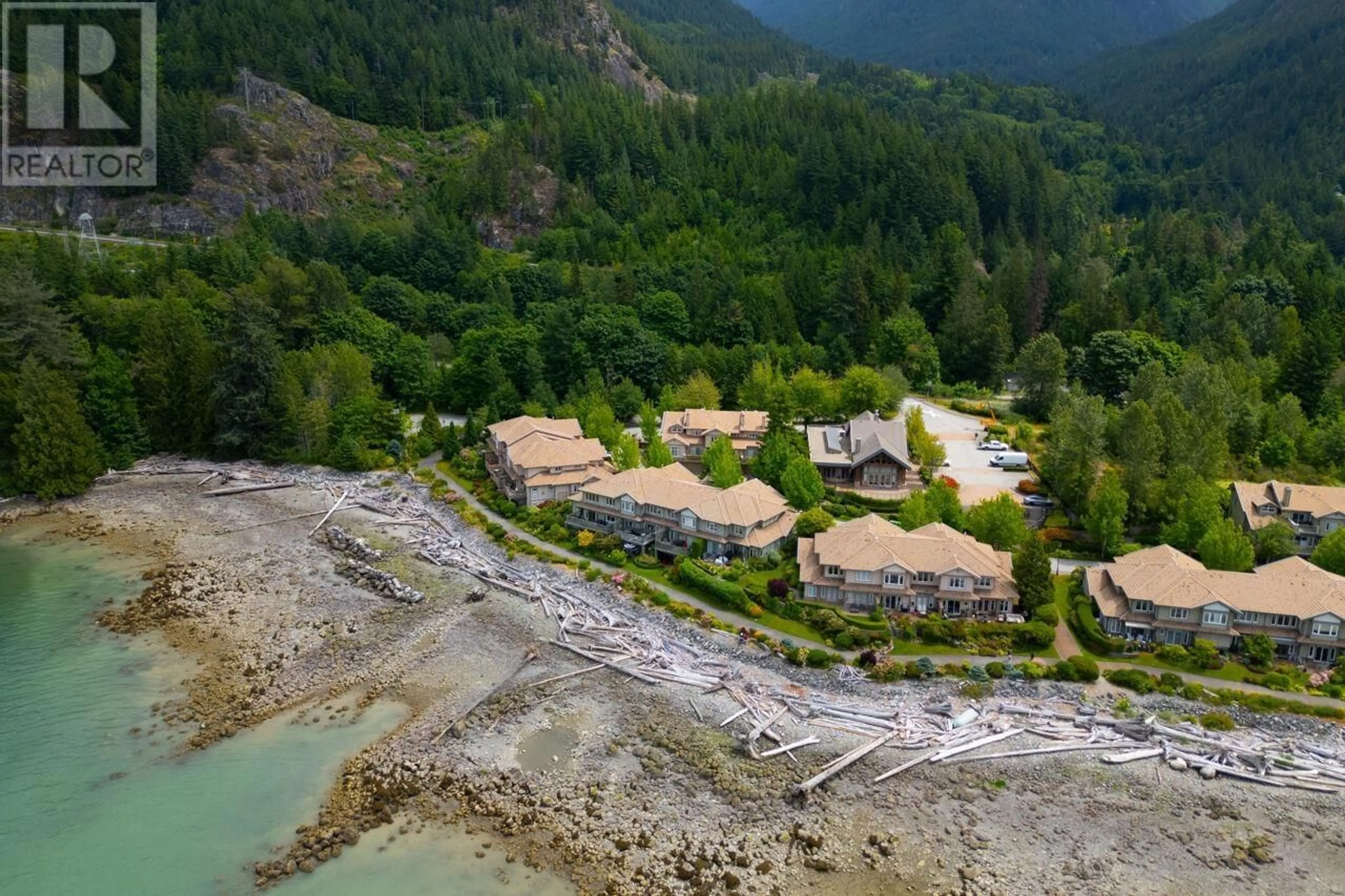 A pic from outside/outdoor area/front of a property/back of a property/a pic from drone, water/lake/river/ocean view for 15 BEACH DRIVE, West Vancouver British Columbia V8B1A2