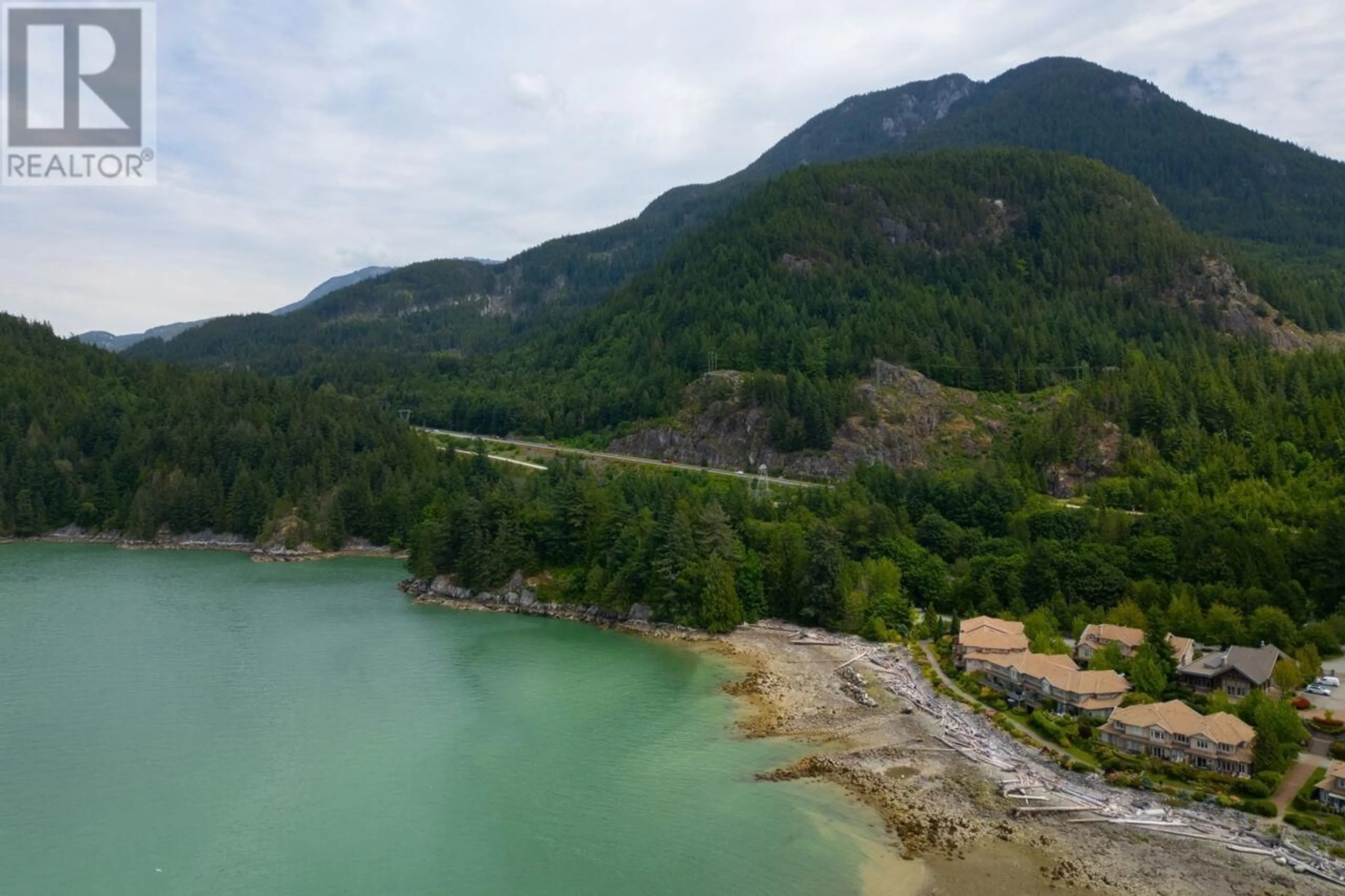A pic from outside/outdoor area/front of a property/back of a property/a pic from drone, water/lake/river/ocean view for 15 BEACH DRIVE, West Vancouver British Columbia V8B1A2