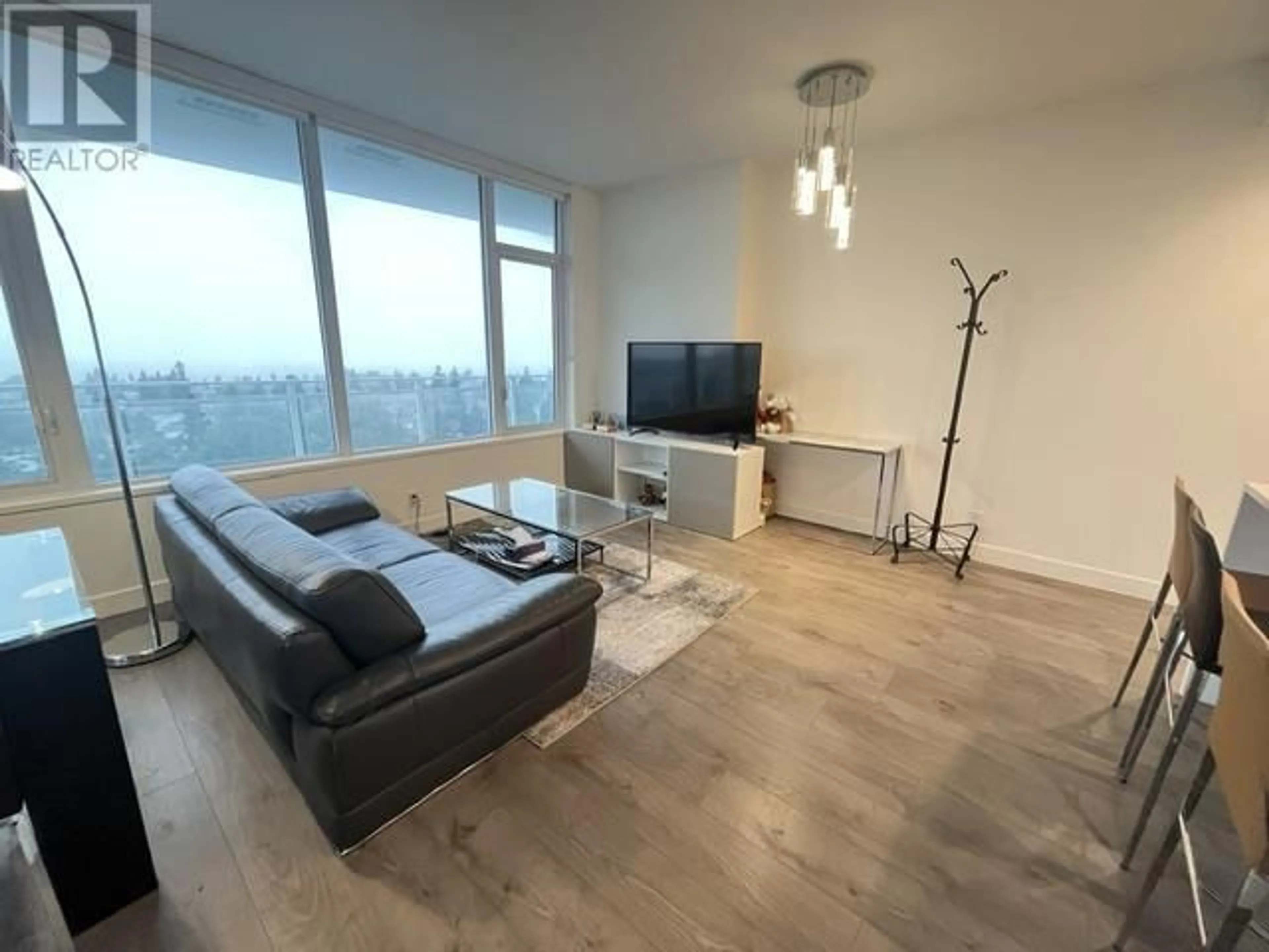 Living room with furniture, wood/laminate floor for 1104 - 5051 IMPERIAL STREET, Burnaby British Columbia V5J0J3