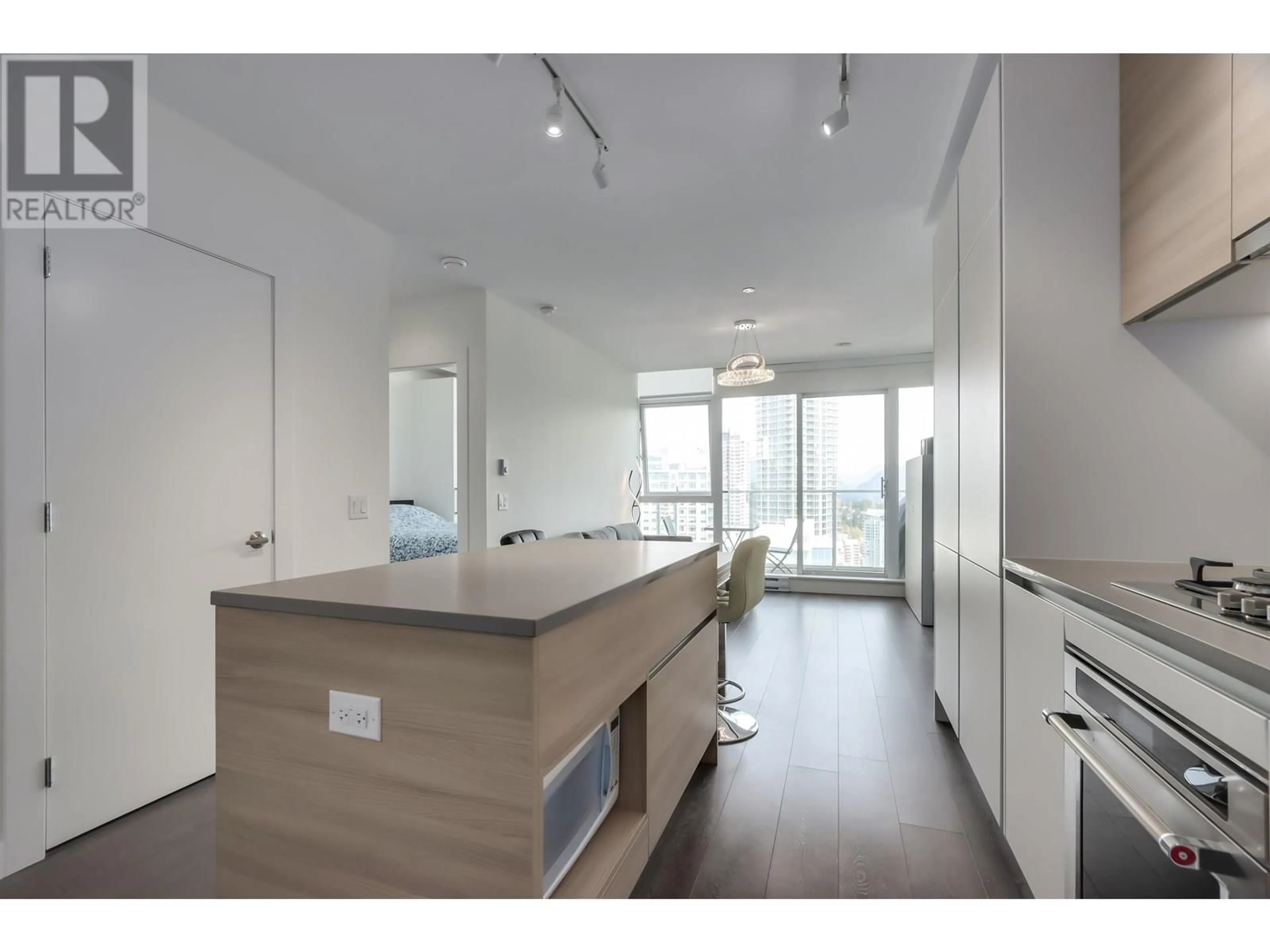 Open concept kitchen, wood/laminate floor for 3601 - 657 WHITING WAY, Coquitlam British Columbia V3J0J6
