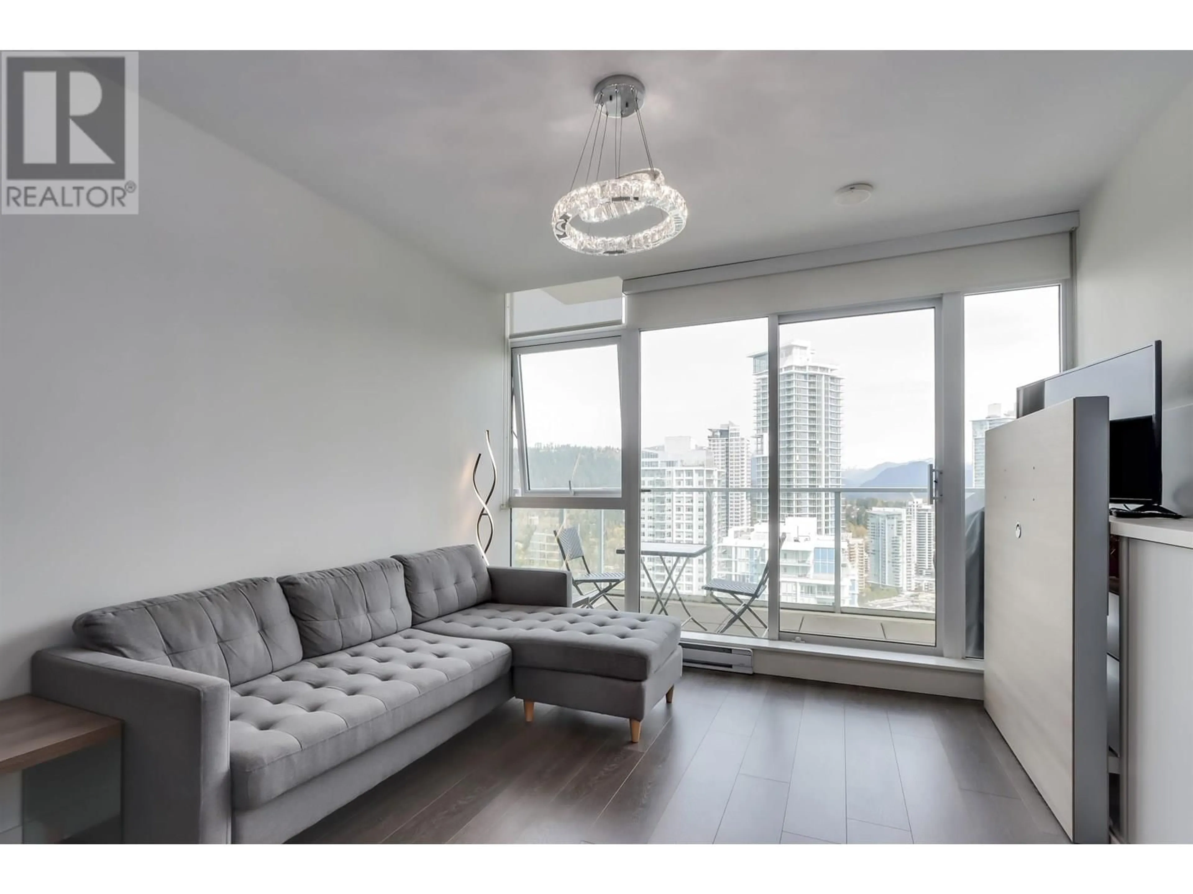 Living room with furniture, wood/laminate floor for 3601 - 657 WHITING WAY, Coquitlam British Columbia V3J0J6