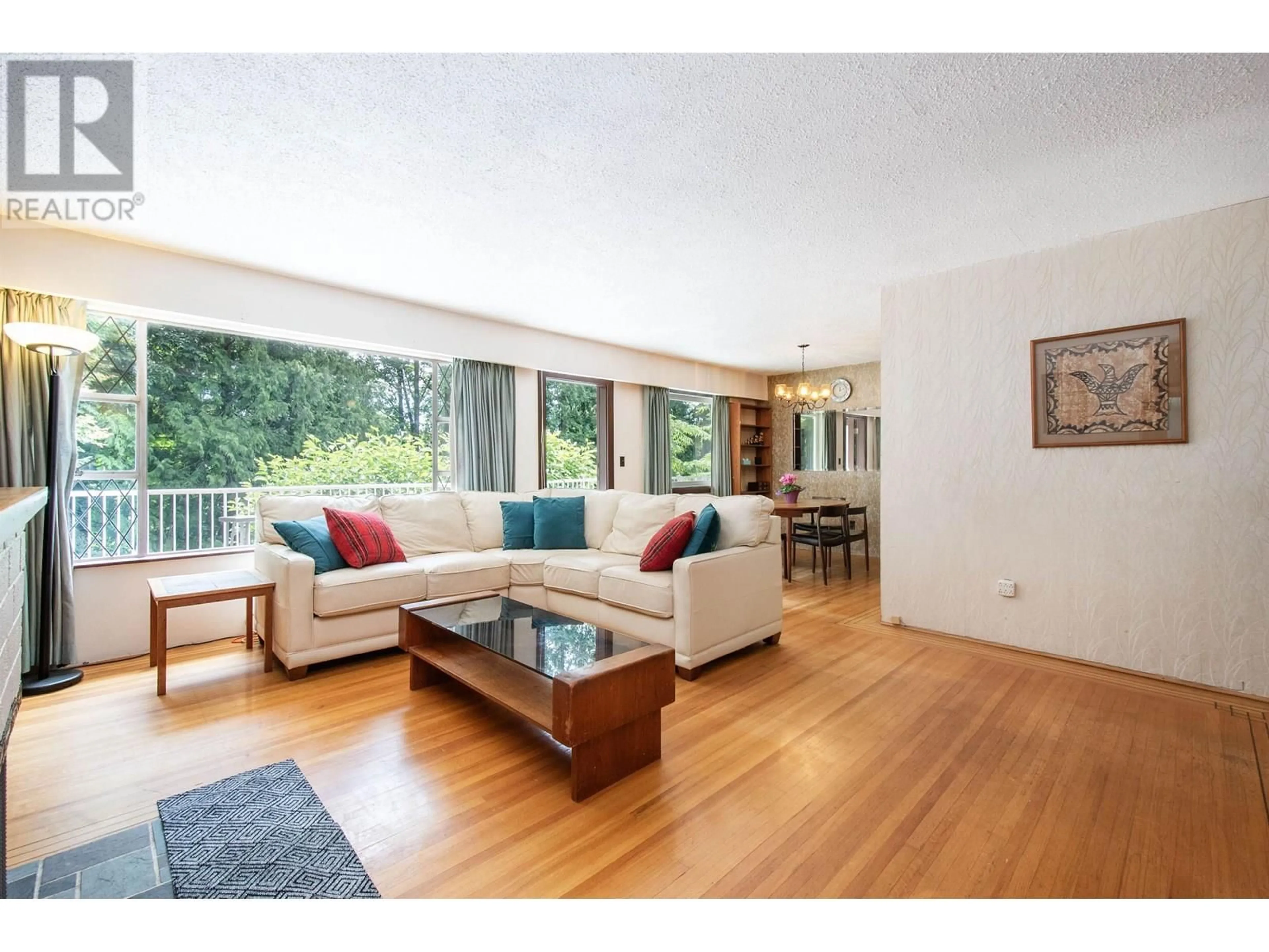 Living room with furniture, wood/laminate floor for 1852 APPIN ROAD, North Vancouver British Columbia V7J2T5