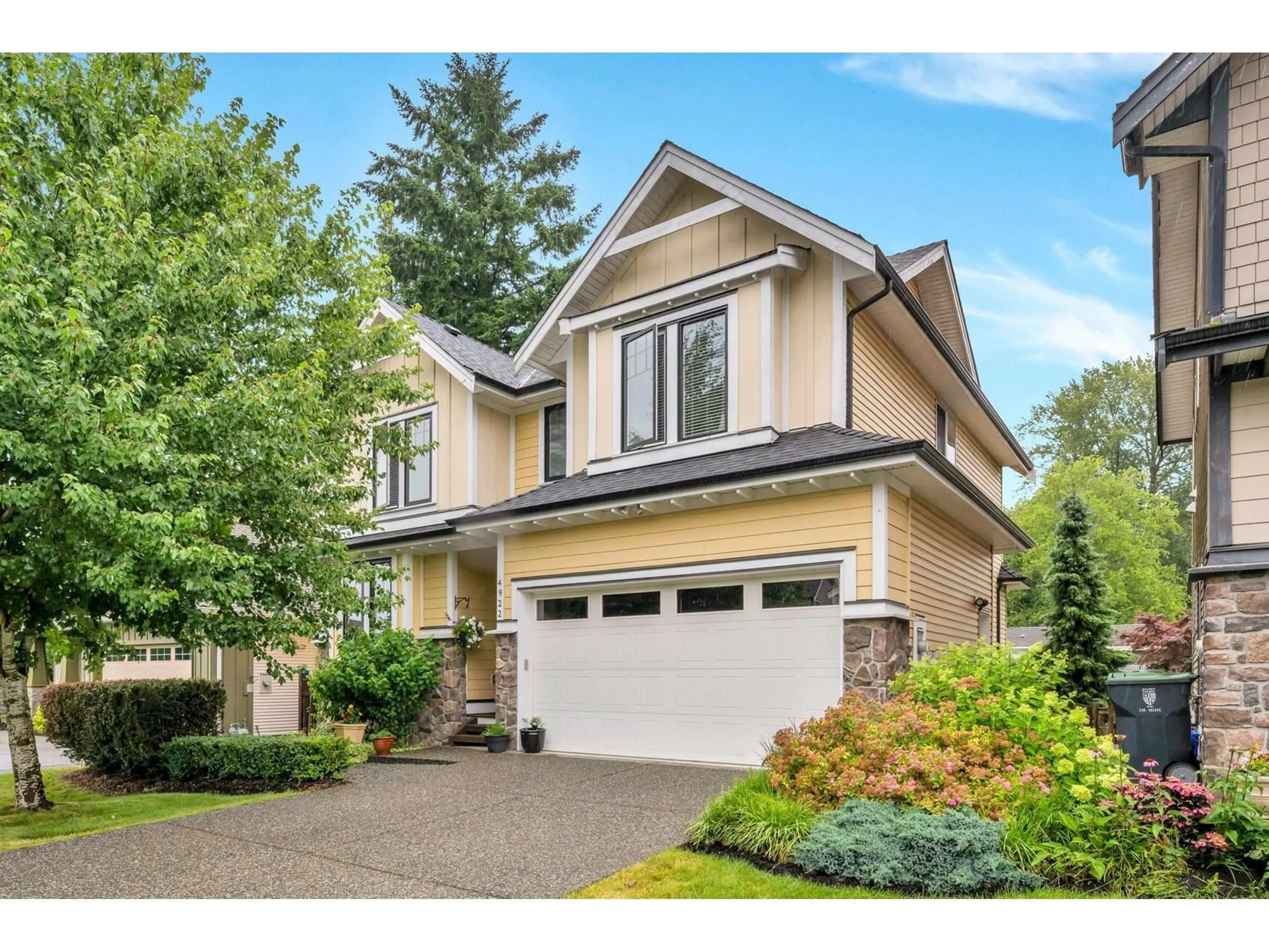 Home with vinyl exterior material, street for 4922 223B, Langley British Columbia V2Y2X6