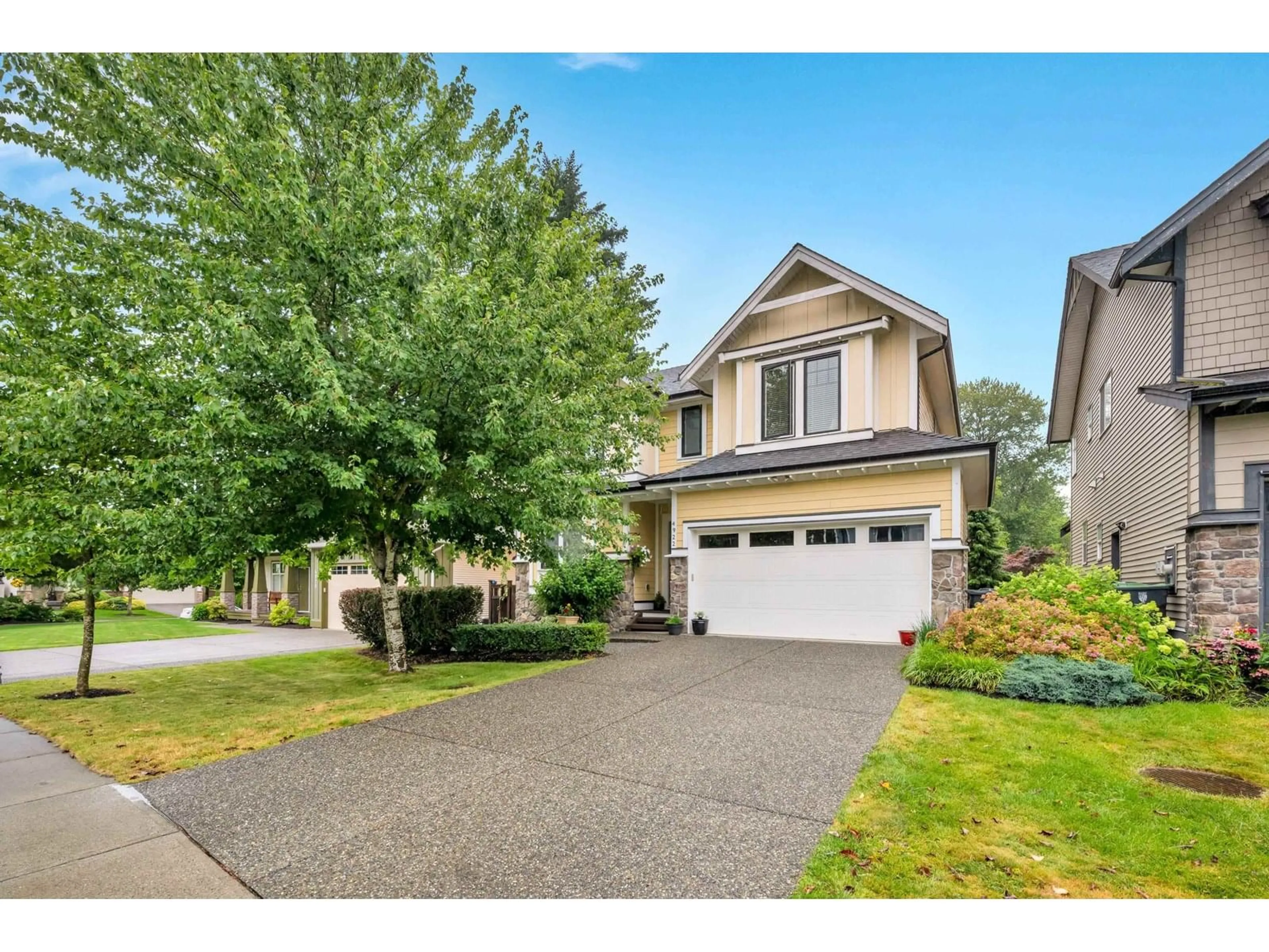 Home with vinyl exterior material, street for 4922 223B, Langley British Columbia V2Y2X6