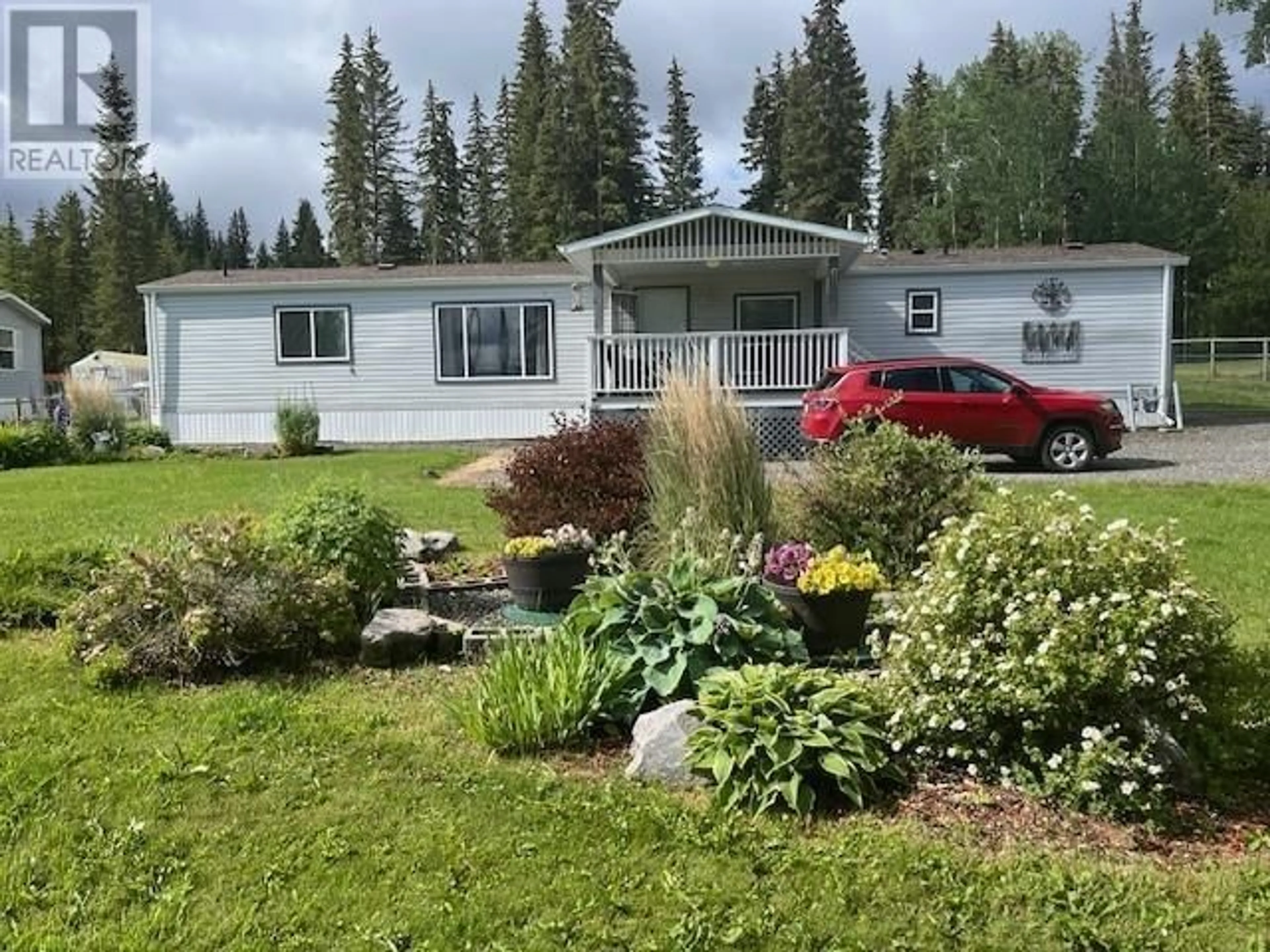 A pic from outside/outdoor area/front of a property/back of a property/a pic from drone, mountain view for 6064 NORMAN ROAD, Horse Lake British Columbia V0K2E3