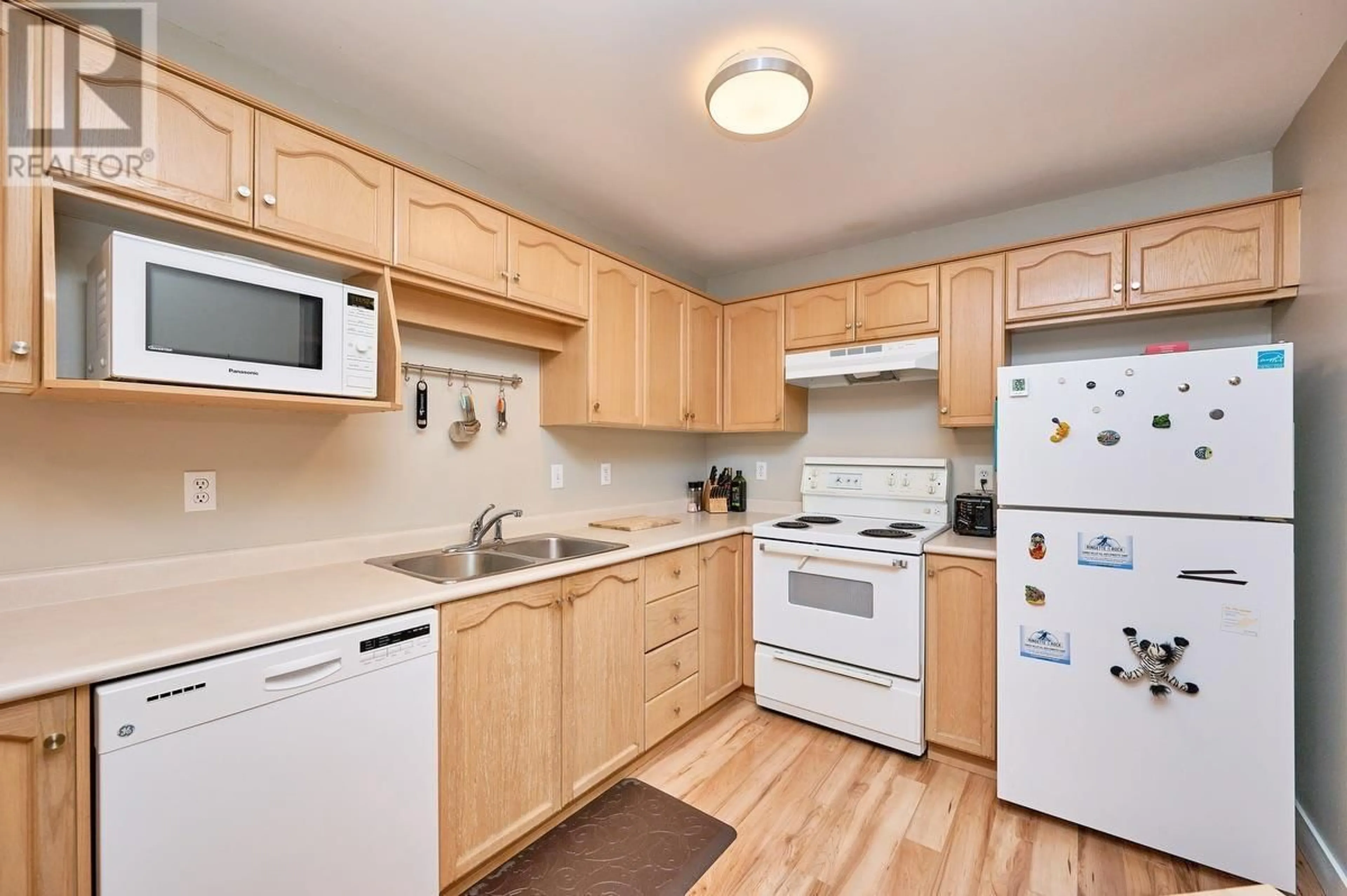 Standard kitchen, wood/laminate floor for 409 - 2615 JANE STREET, Port Coquitlam British Columbia V3C3K3