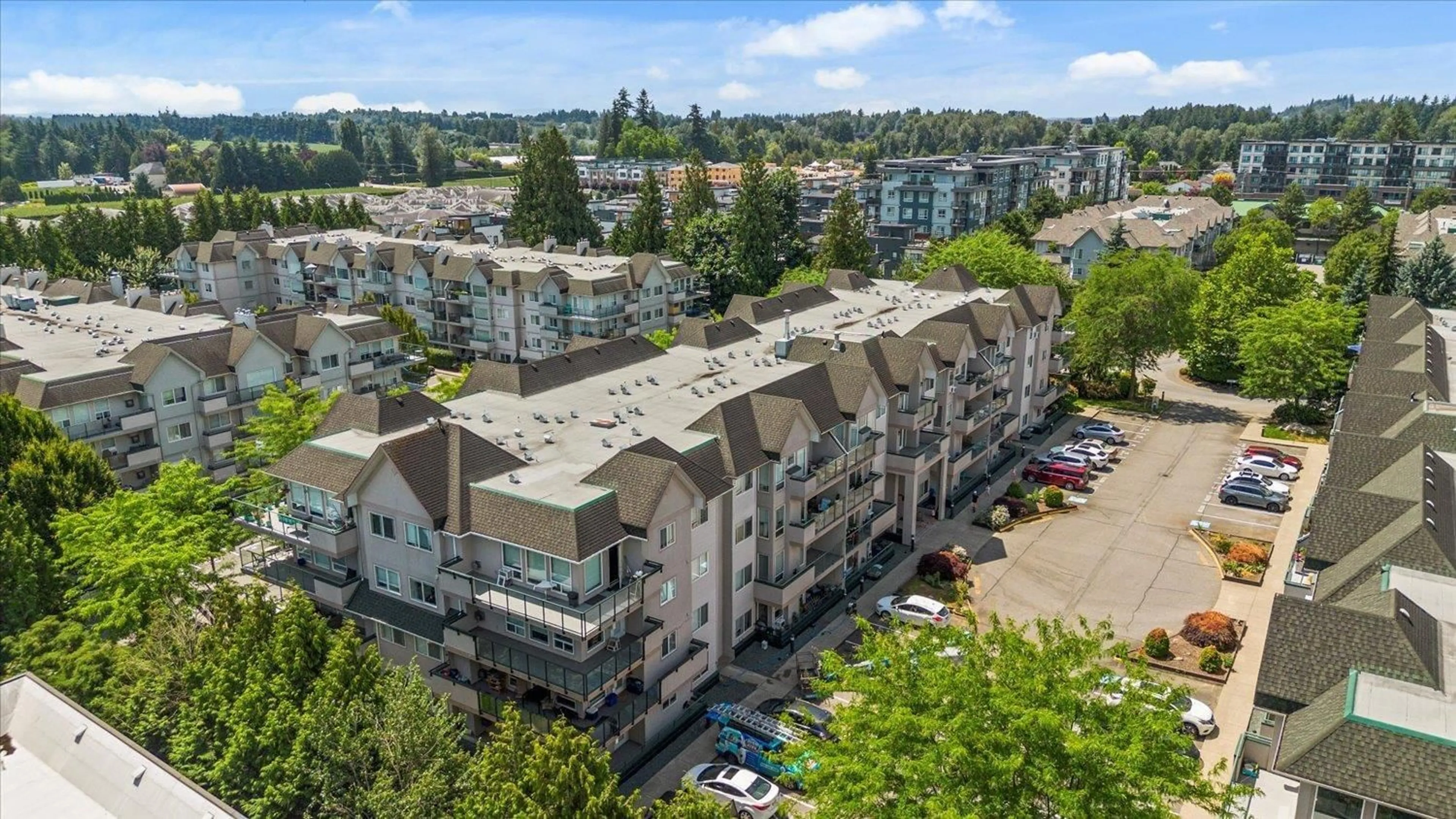 A pic from outside/outdoor area/front of a property/back of a property/a pic from drone, city buildings view from balcony for 406 - 33728 KING, Abbotsford British Columbia V3S8J4