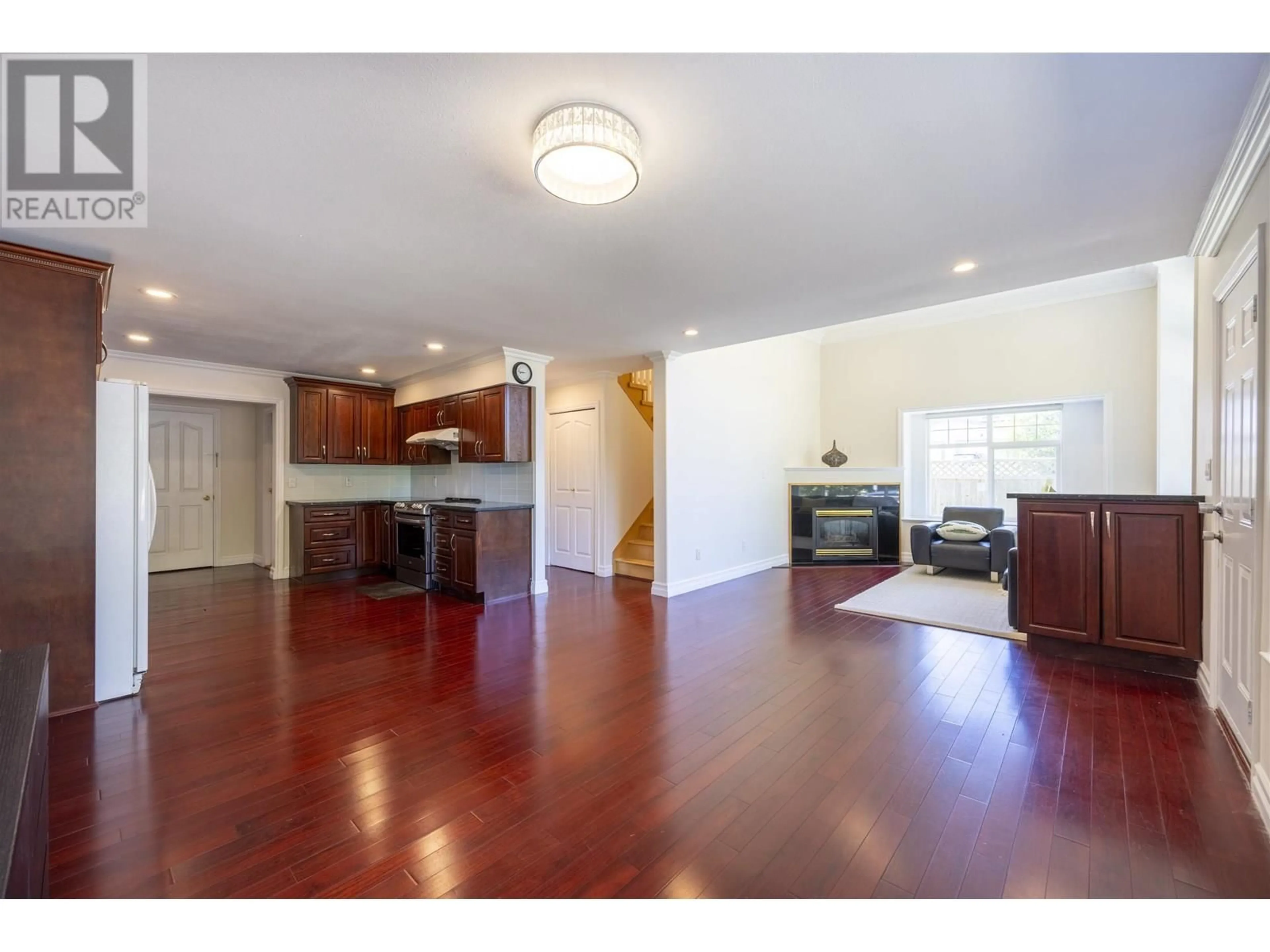 Open concept kitchen, wood/laminate floor for 4370 SARDIS STREET, Burnaby British Columbia V5H1K7