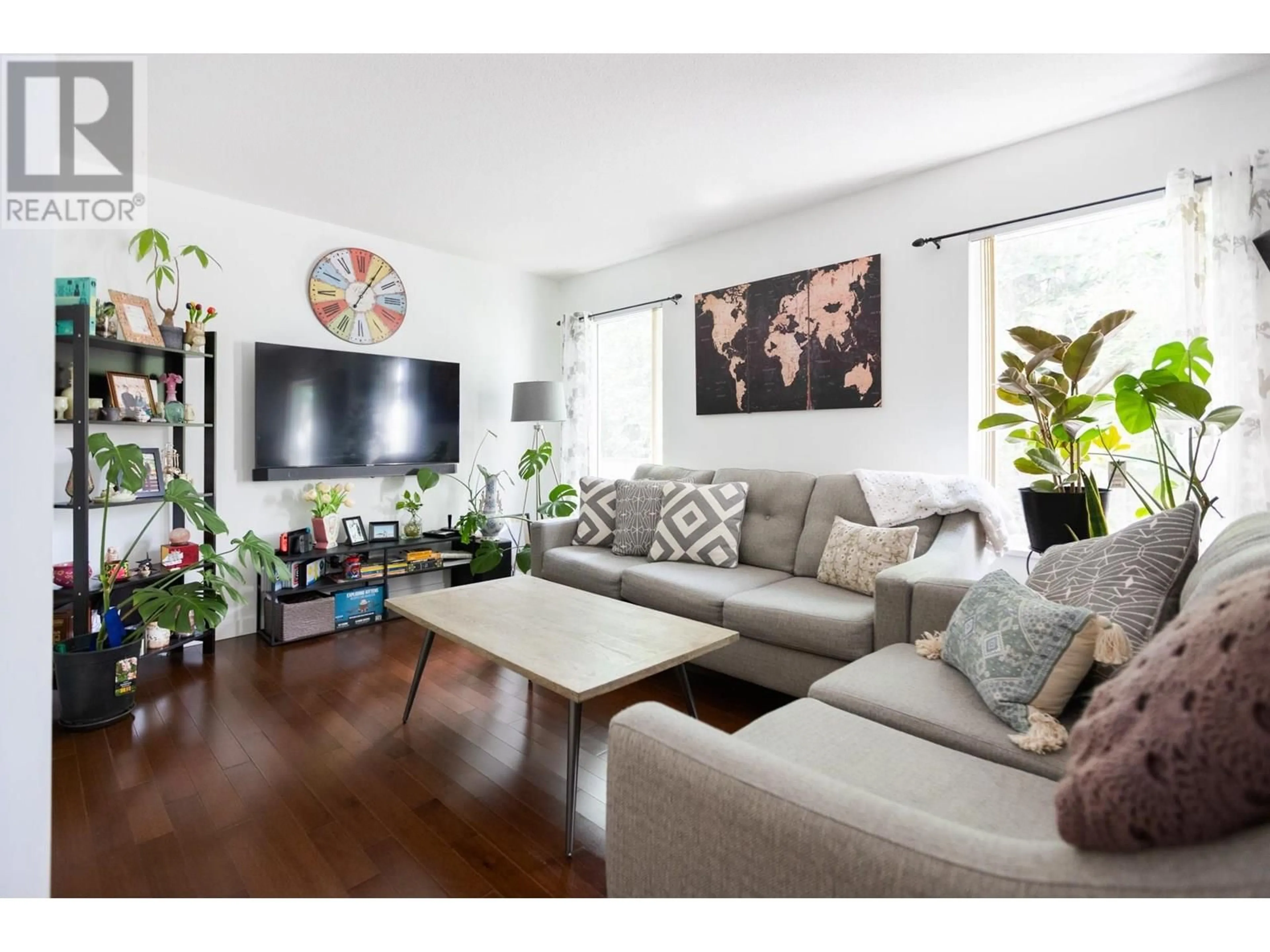 Living room with furniture, wood/laminate floor for 119 - 3885 RICHET STREET, Prince George British Columbia V2K2J2