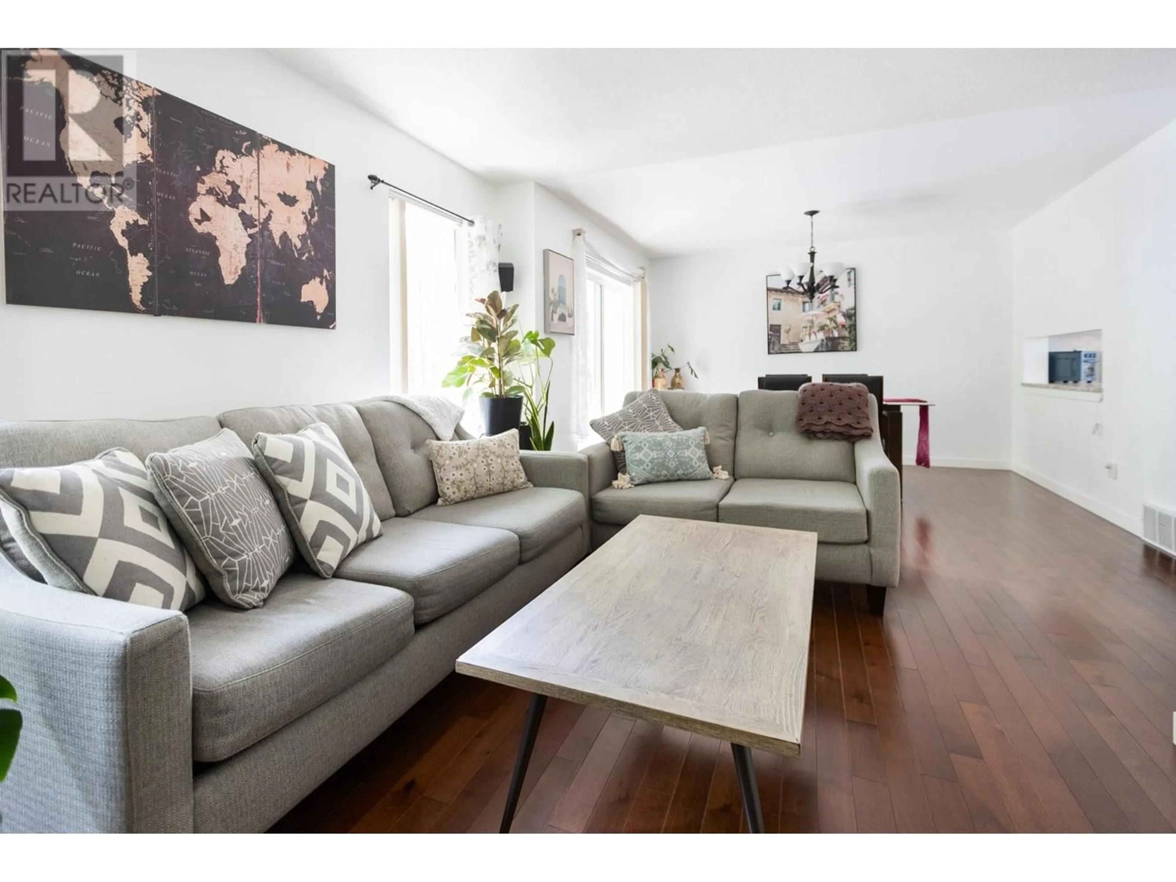 Living room with furniture, wood/laminate floor for 119 - 3885 RICHET STREET, Prince George British Columbia V2K2J2