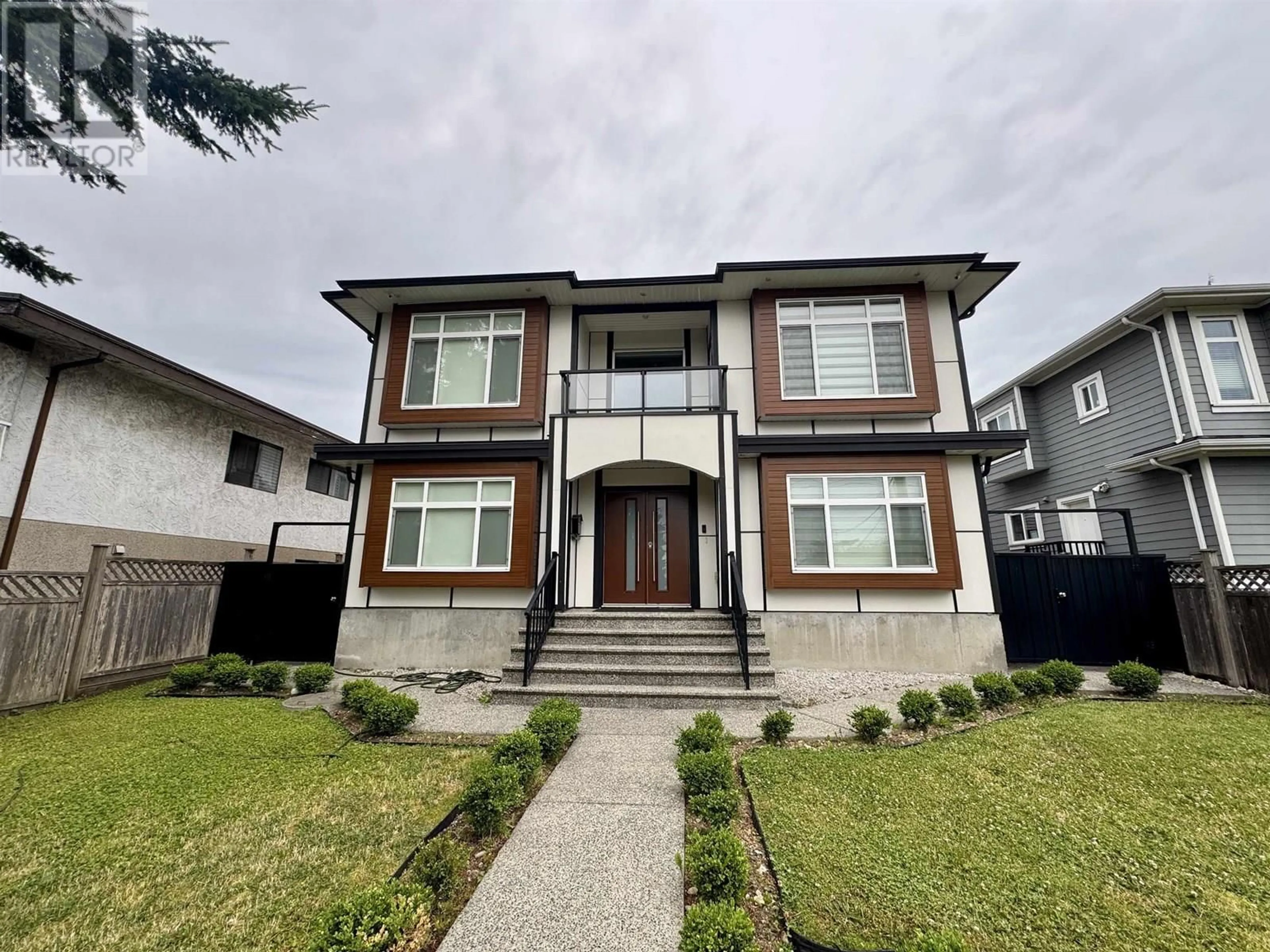 Home with vinyl exterior material, street for 8175 10TH AVENUE, Burnaby British Columbia V3N2S5