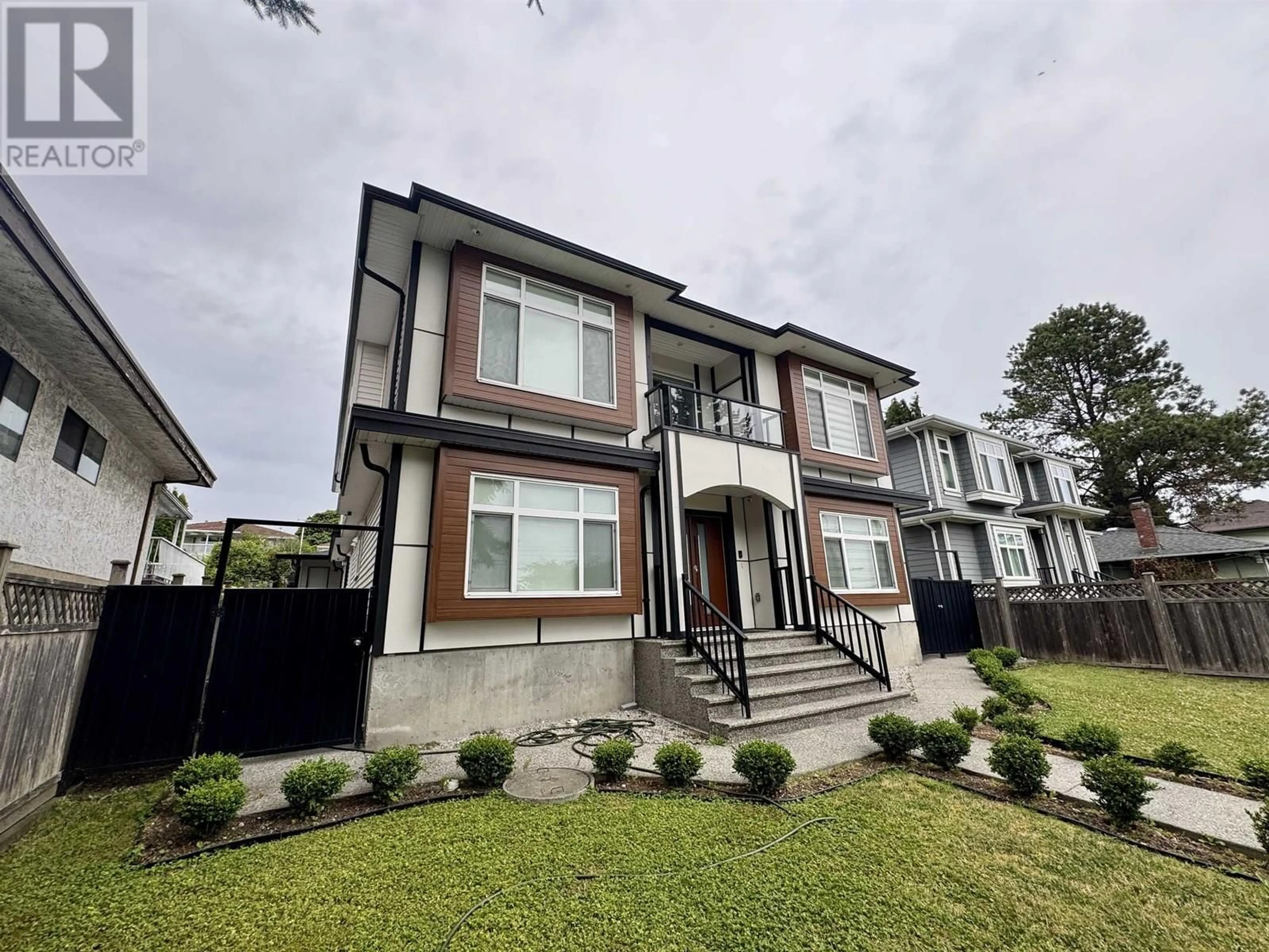 Home with brick exterior material, street for 8175 10TH AVENUE, Burnaby British Columbia V3N2S5