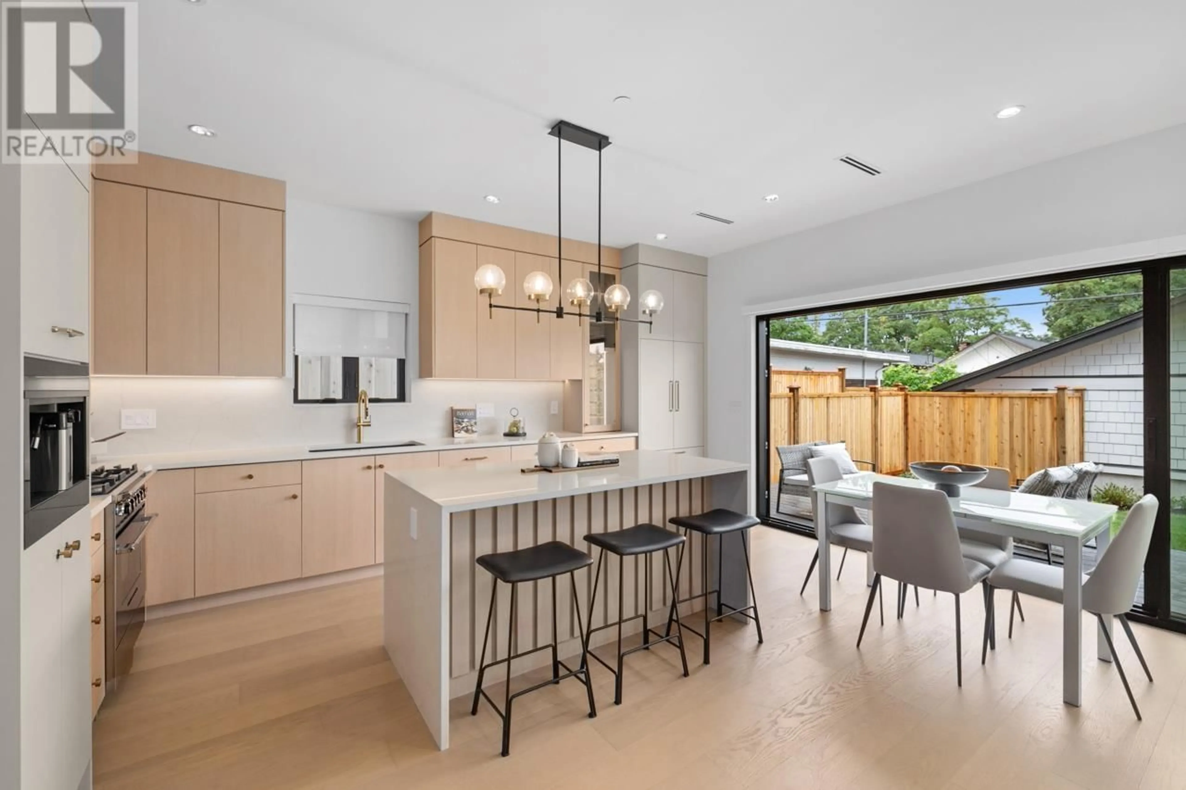 Open concept kitchen, ceramic/tile floor for 2 - 2247 PARKER STREET, Vancouver British Columbia V5L2L8