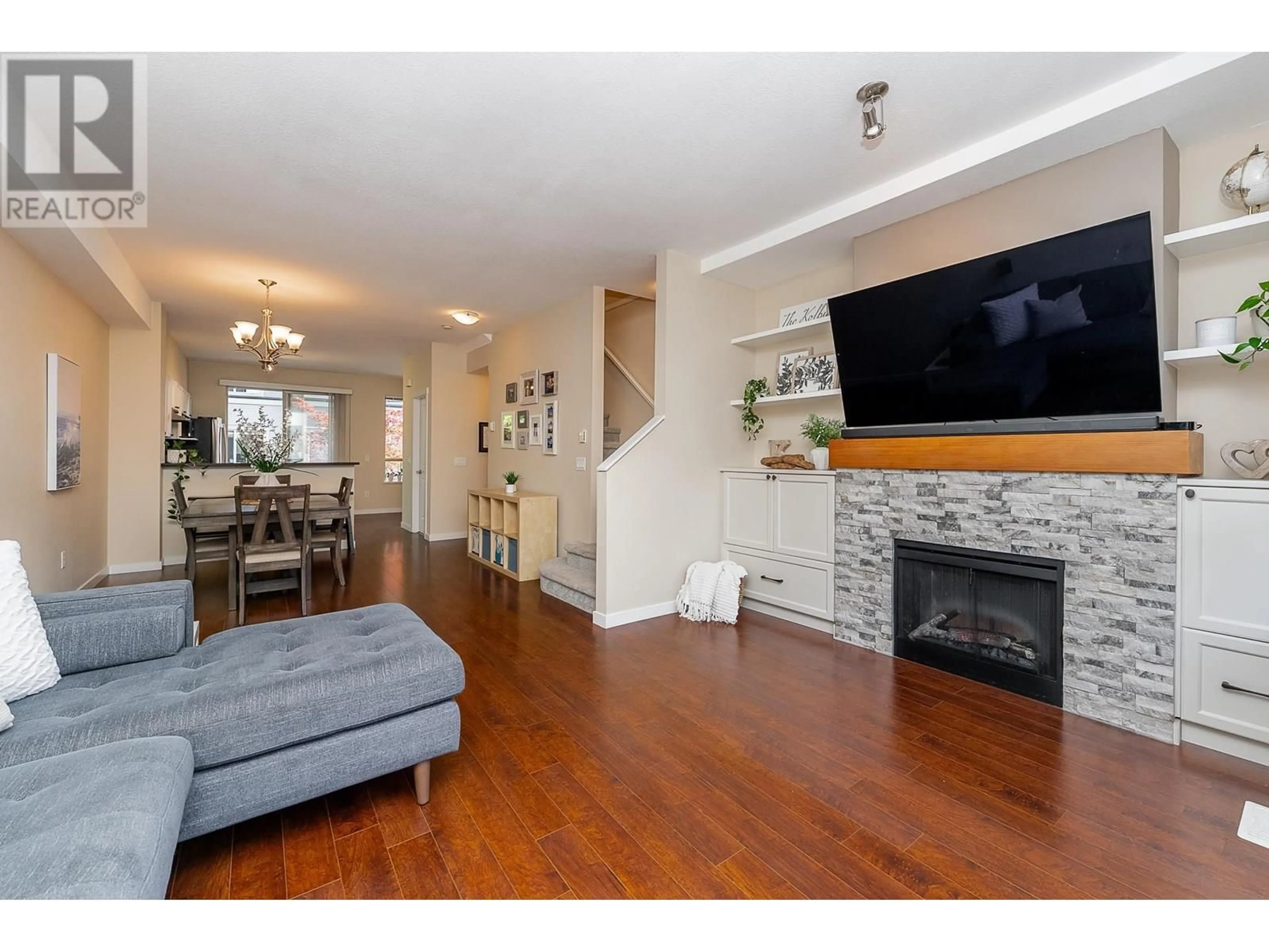 Living room with furniture, wood/laminate floor for 17 - 100 KLAHANIE DRIVE, Port Moody British Columbia V3H5K3