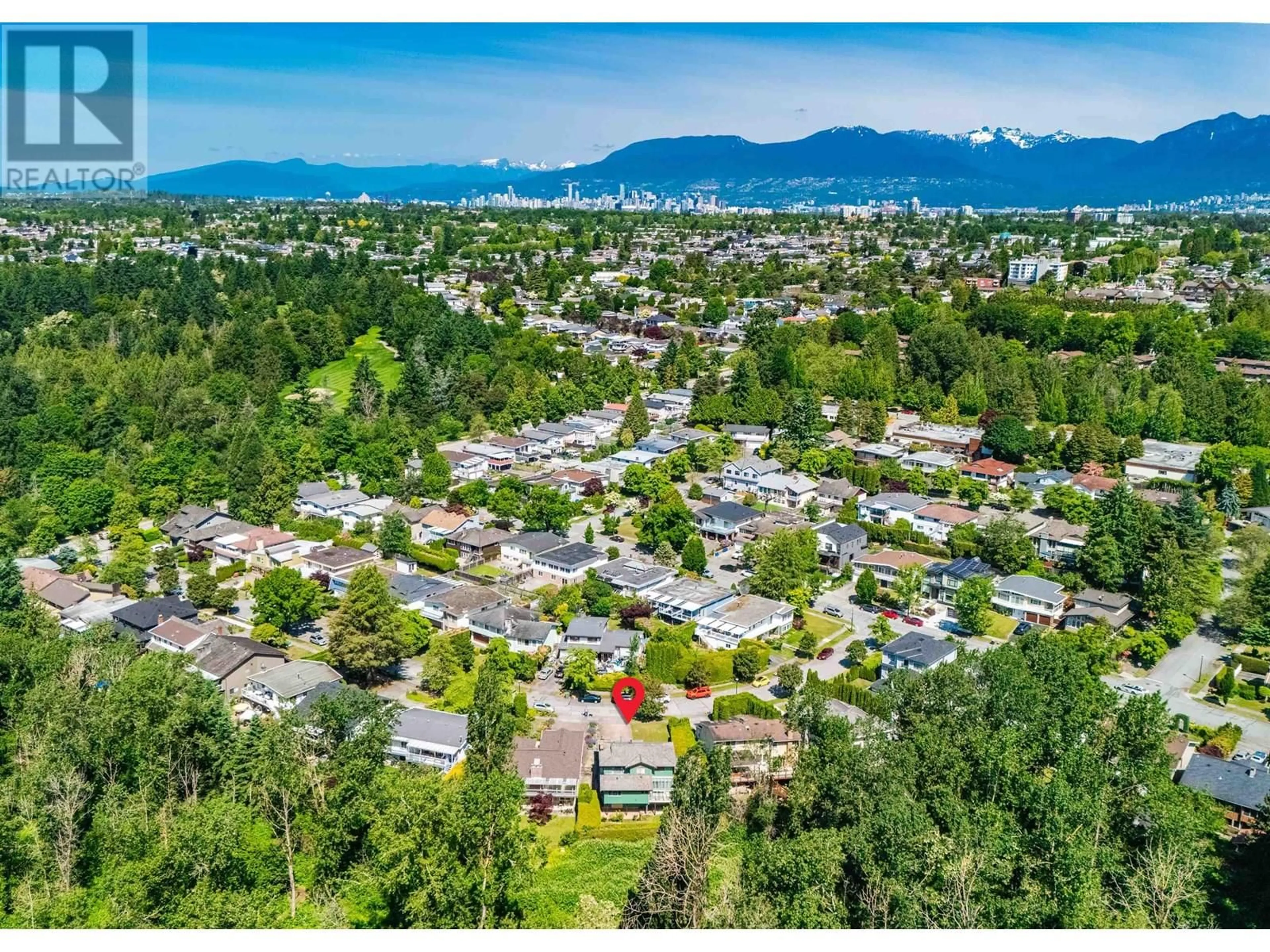 A pic from outside/outdoor area/front of a property/back of a property/a pic from drone, mountain view for 3178 63RD AVENUE, Vancouver British Columbia V5S2G8