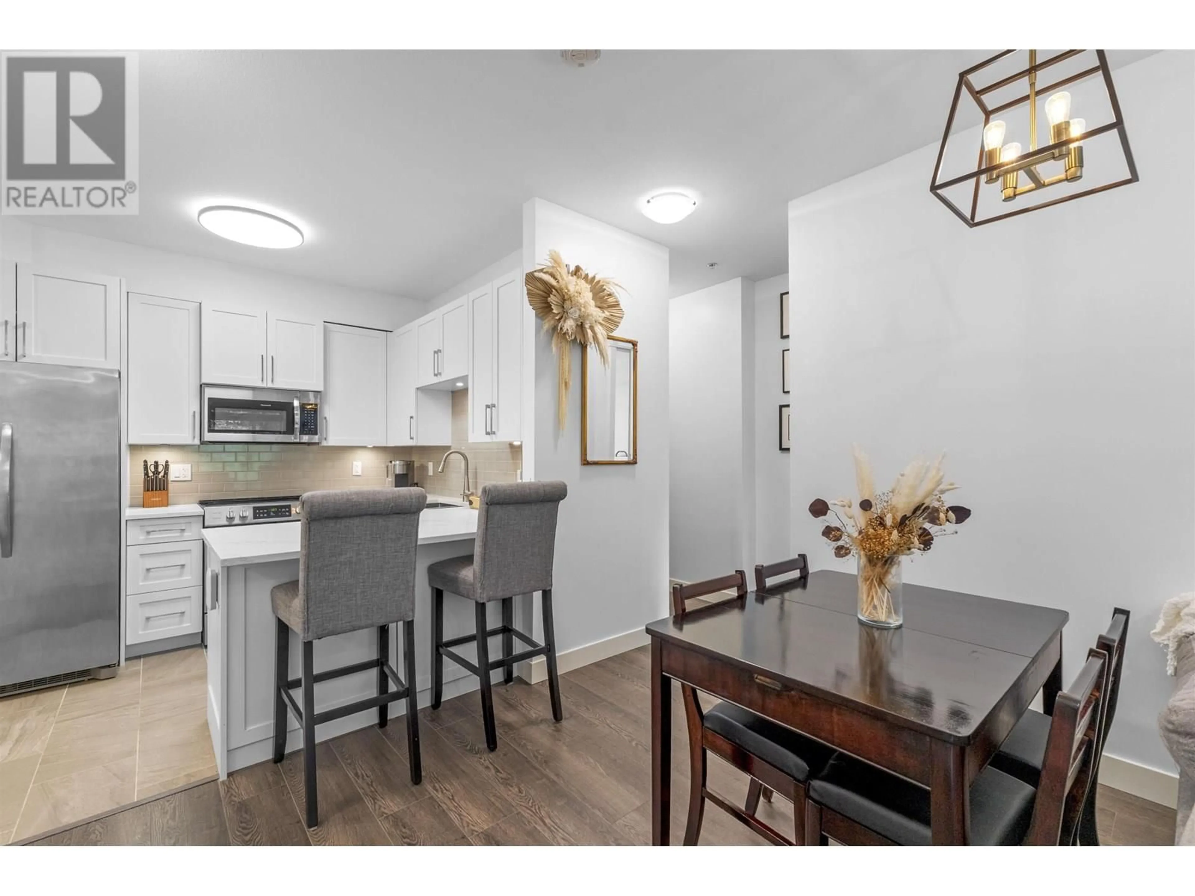 Open concept kitchen, wood/laminate floor for 208 - 12525 190A STREET, Pitt Meadows British Columbia V3Y0E1