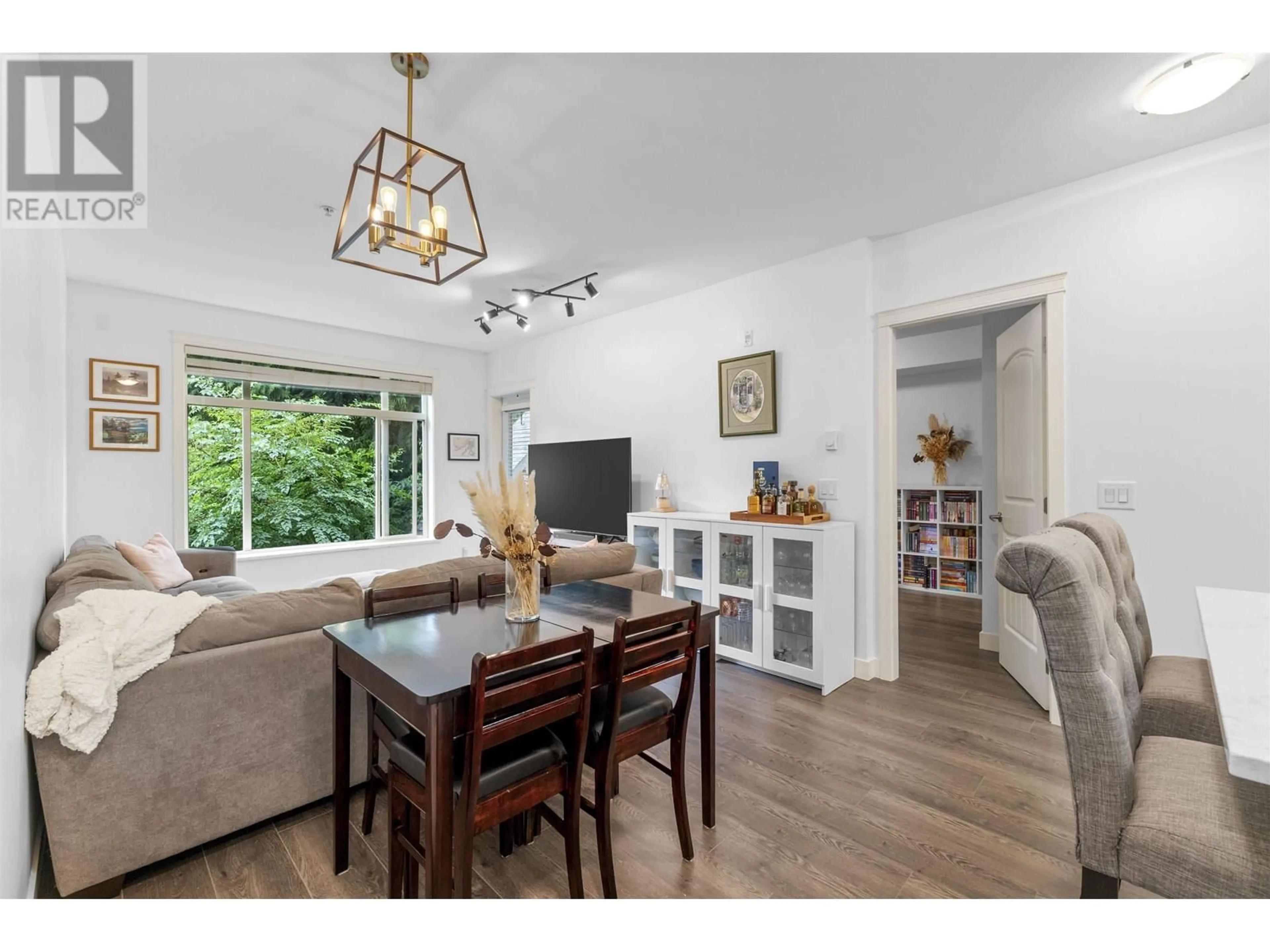 Living room with furniture, wood/laminate floor for 208 - 12525 190A STREET, Pitt Meadows British Columbia V3Y0E1