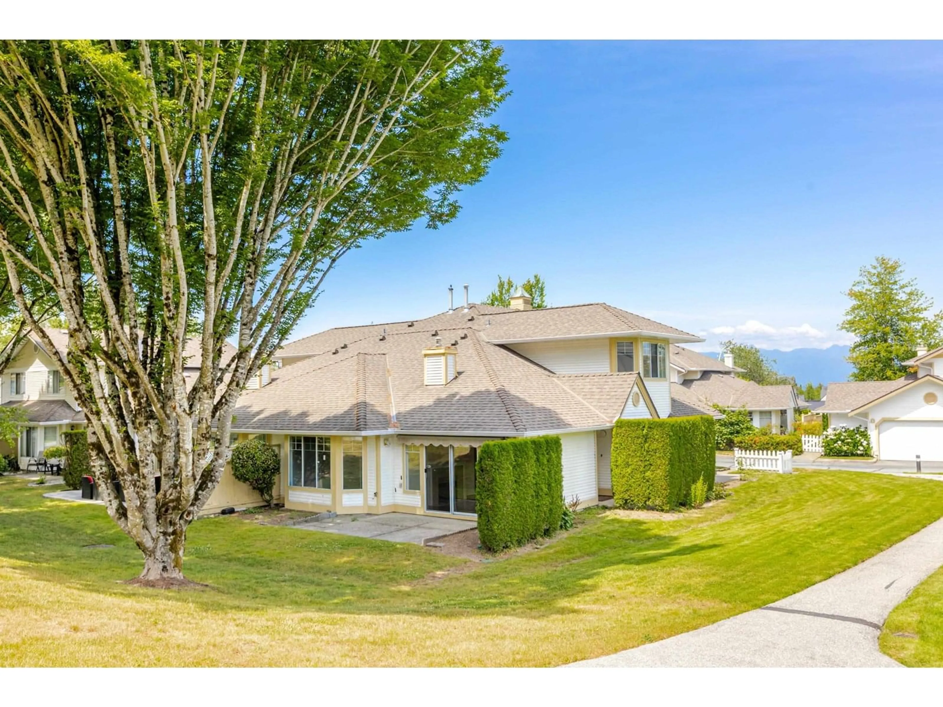 A pic from outside/outdoor area/front of a property/back of a property/a pic from drone, water/lake/river/ocean view for 6 - 21138 88TH, Langley British Columbia V1M2G7
