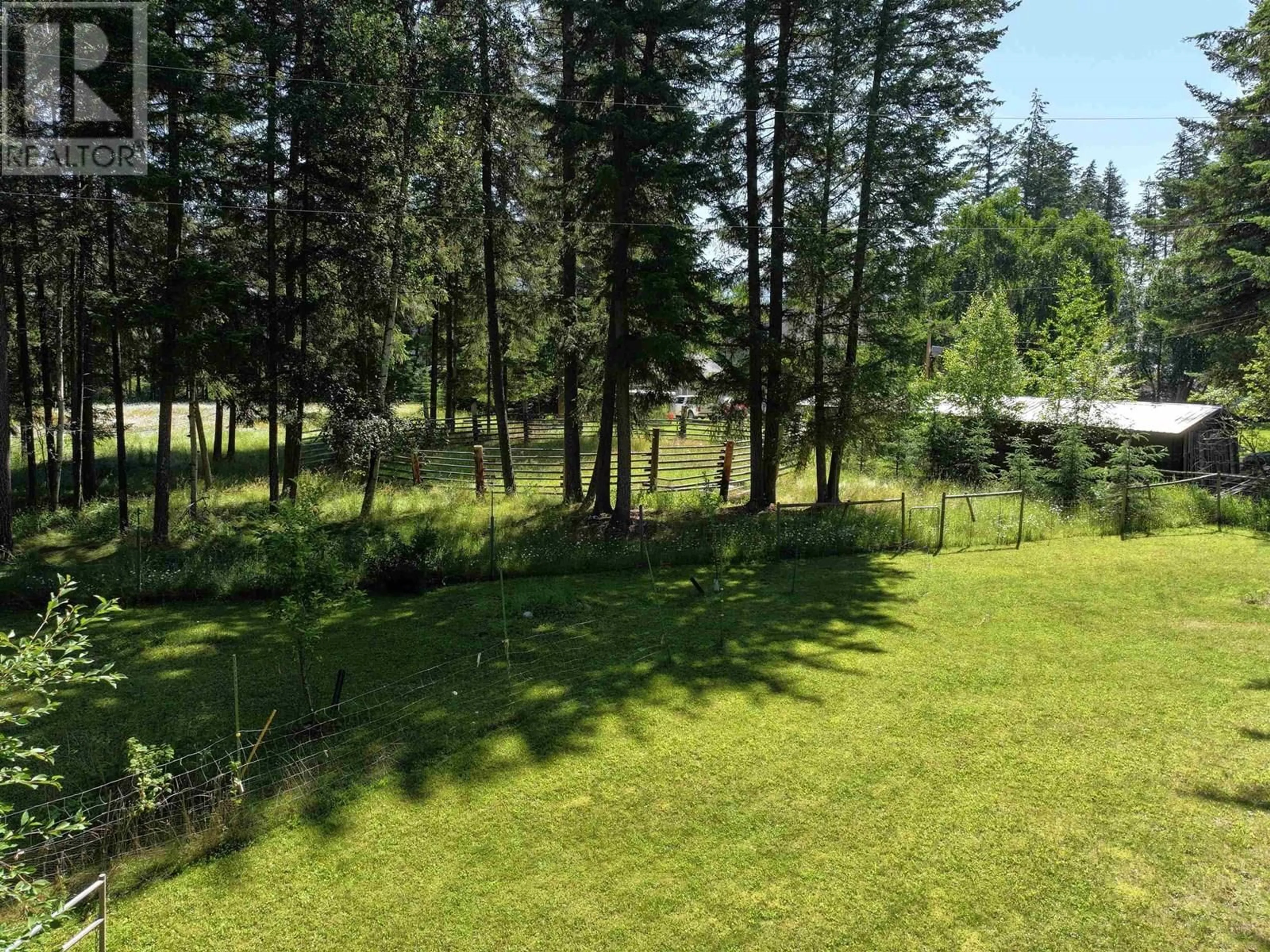 A pic from outside/outdoor area/front of a property/back of a property/a pic from drone, forest/trees view for 112 COREY ROAD, Quesnel British Columbia V2J6J9