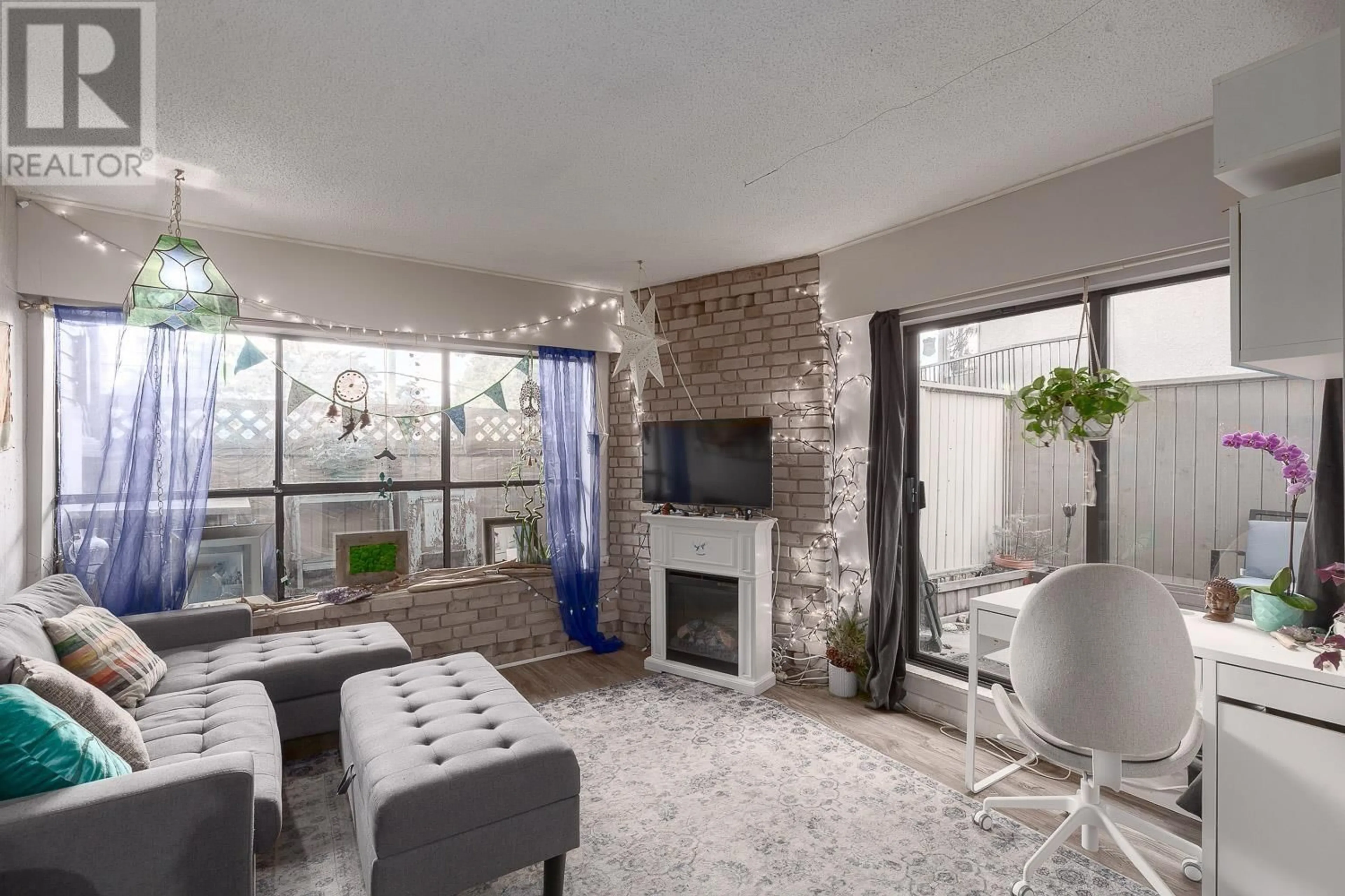 Living room with furniture, unknown for 102 - 2234 PRINCE ALBERT STREET, Vancouver British Columbia V5T4K9
