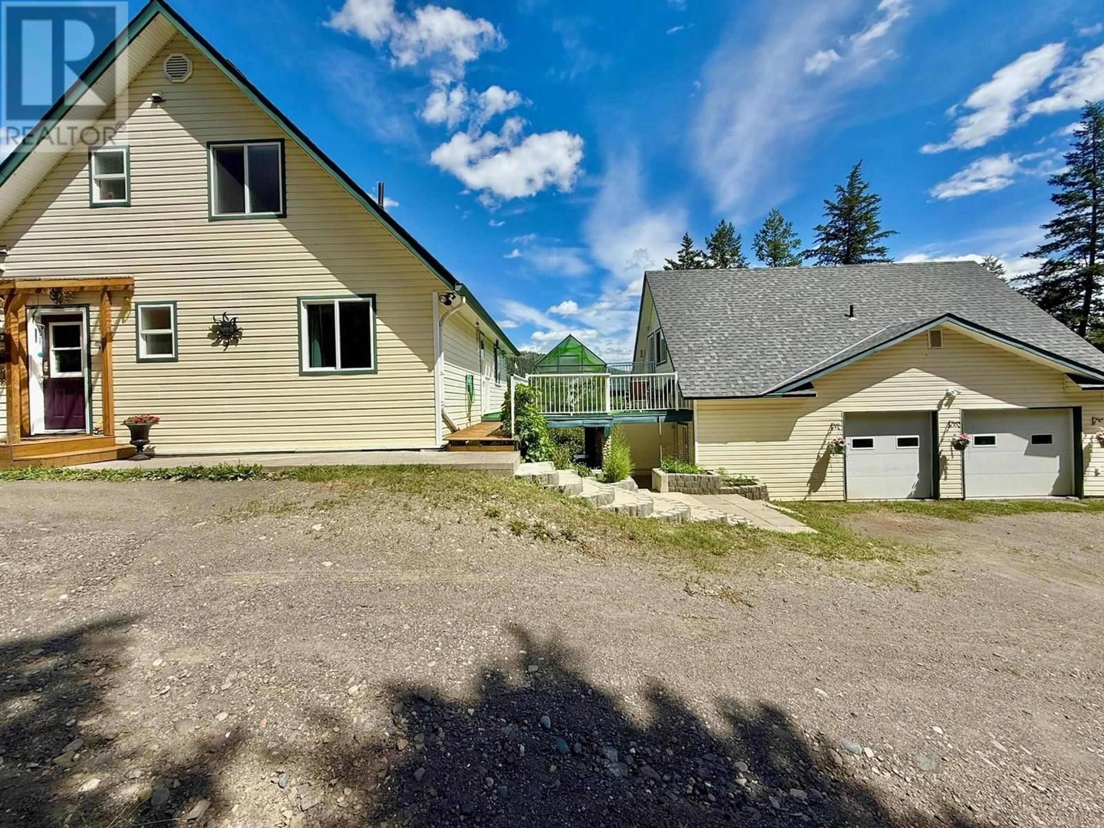 A pic from outside/outdoor area/front of a property/back of a property/a pic from drone, mountain view for 1946 SOUTH LAKESIDE DRIVE, Williams Lake British Columbia V2G5G1