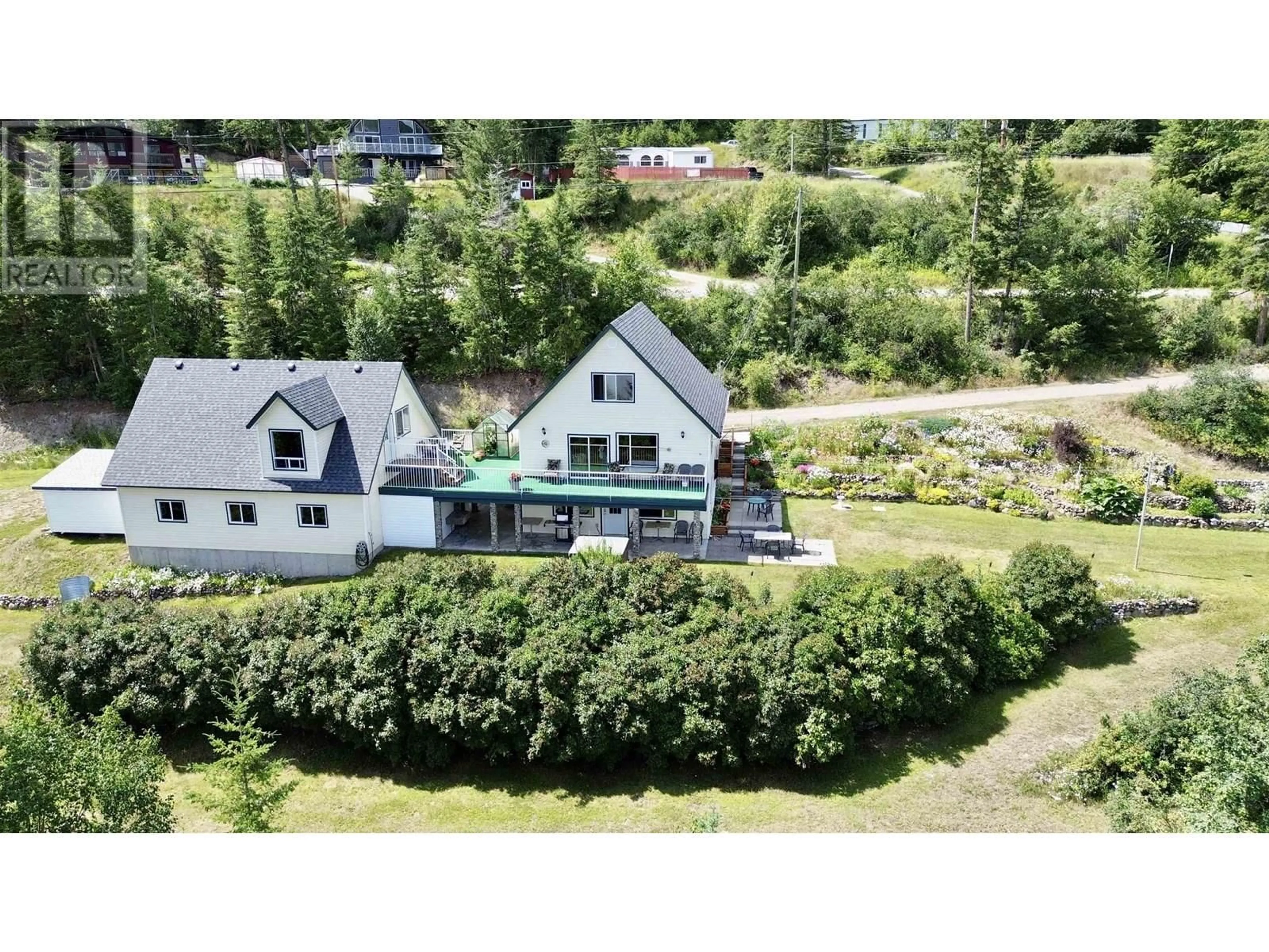 A pic from outside/outdoor area/front of a property/back of a property/a pic from drone, mountain view for 1946 SOUTH LAKESIDE DRIVE, Williams Lake British Columbia V2G5G1