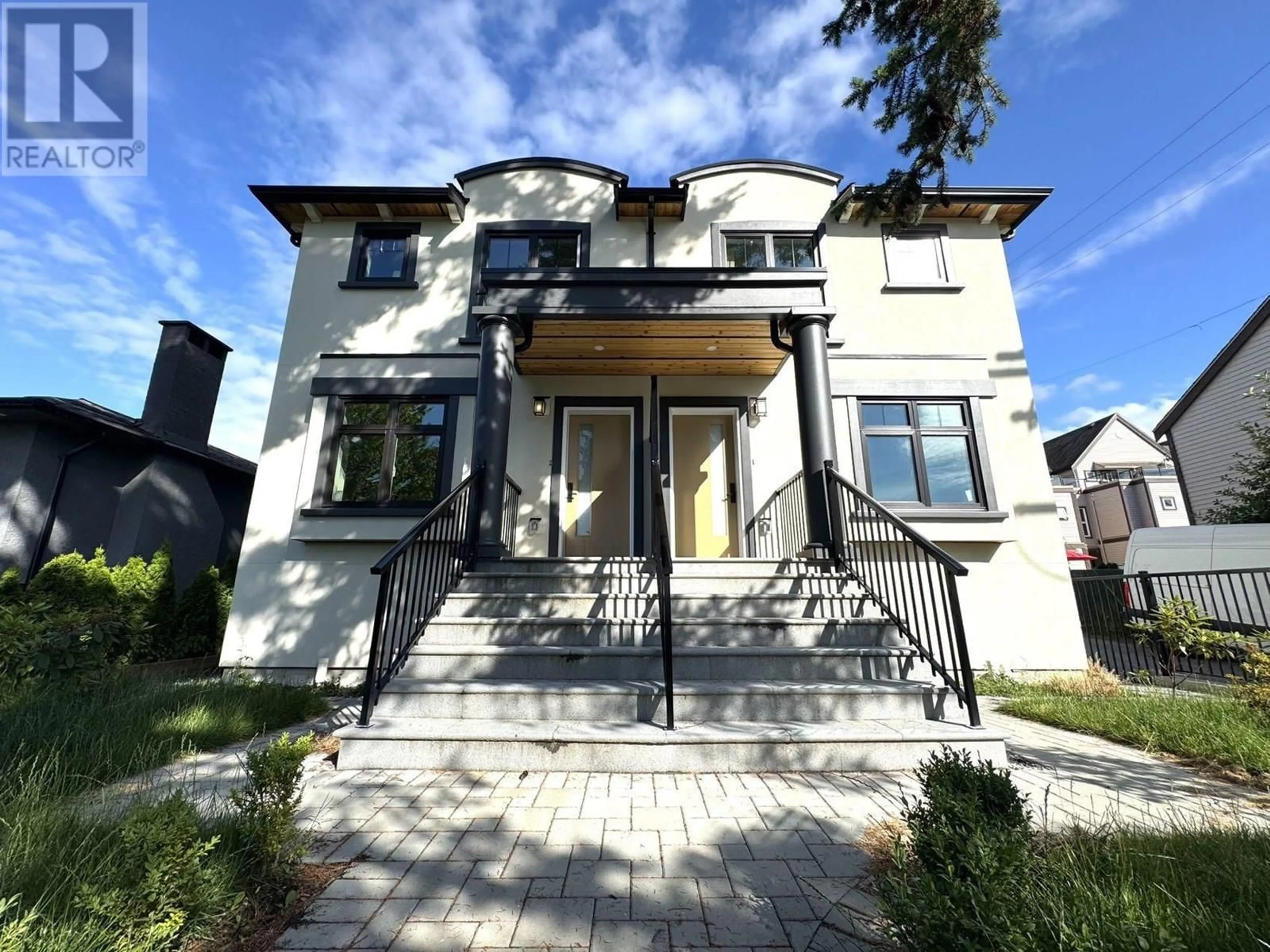 Home with brick exterior material, street for 5216 RUPERT STREET, Vancouver British Columbia V5R2J9