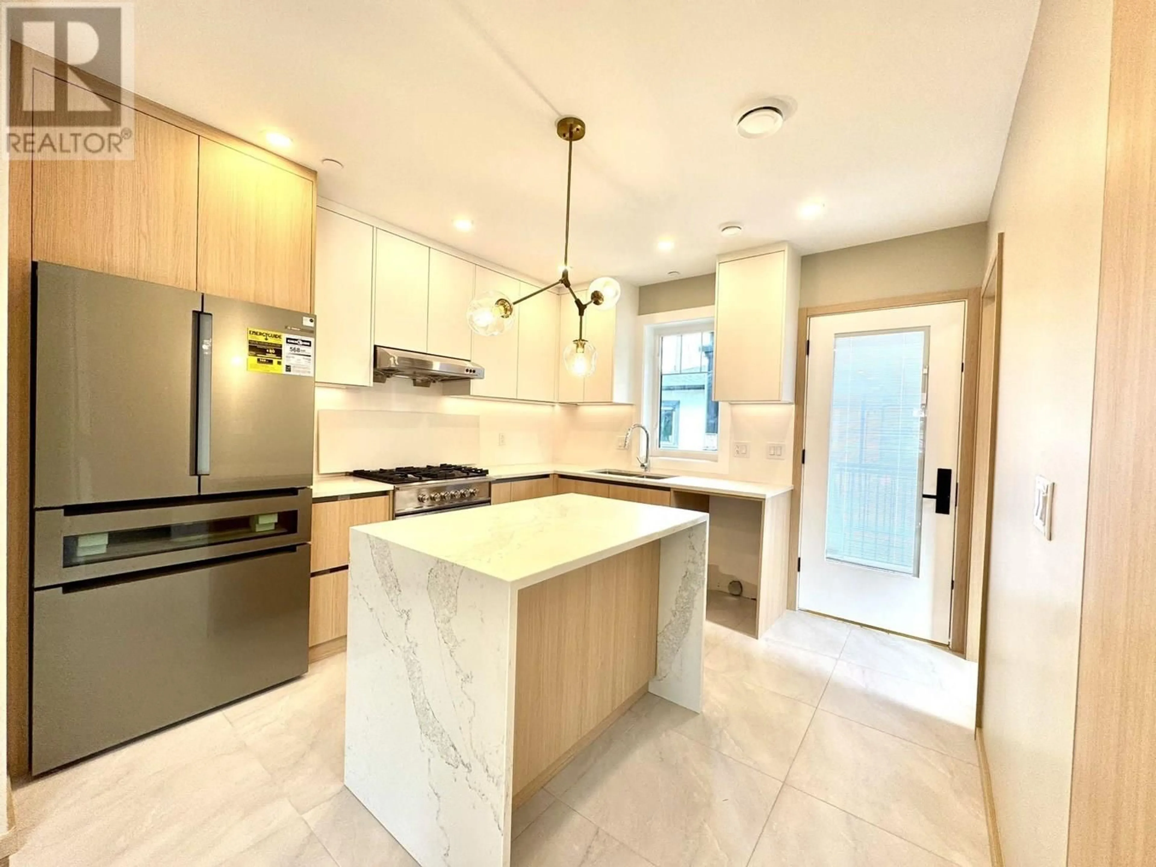 Contemporary kitchen, ceramic/tile floor for 5216 RUPERT STREET, Vancouver British Columbia V5R2J9