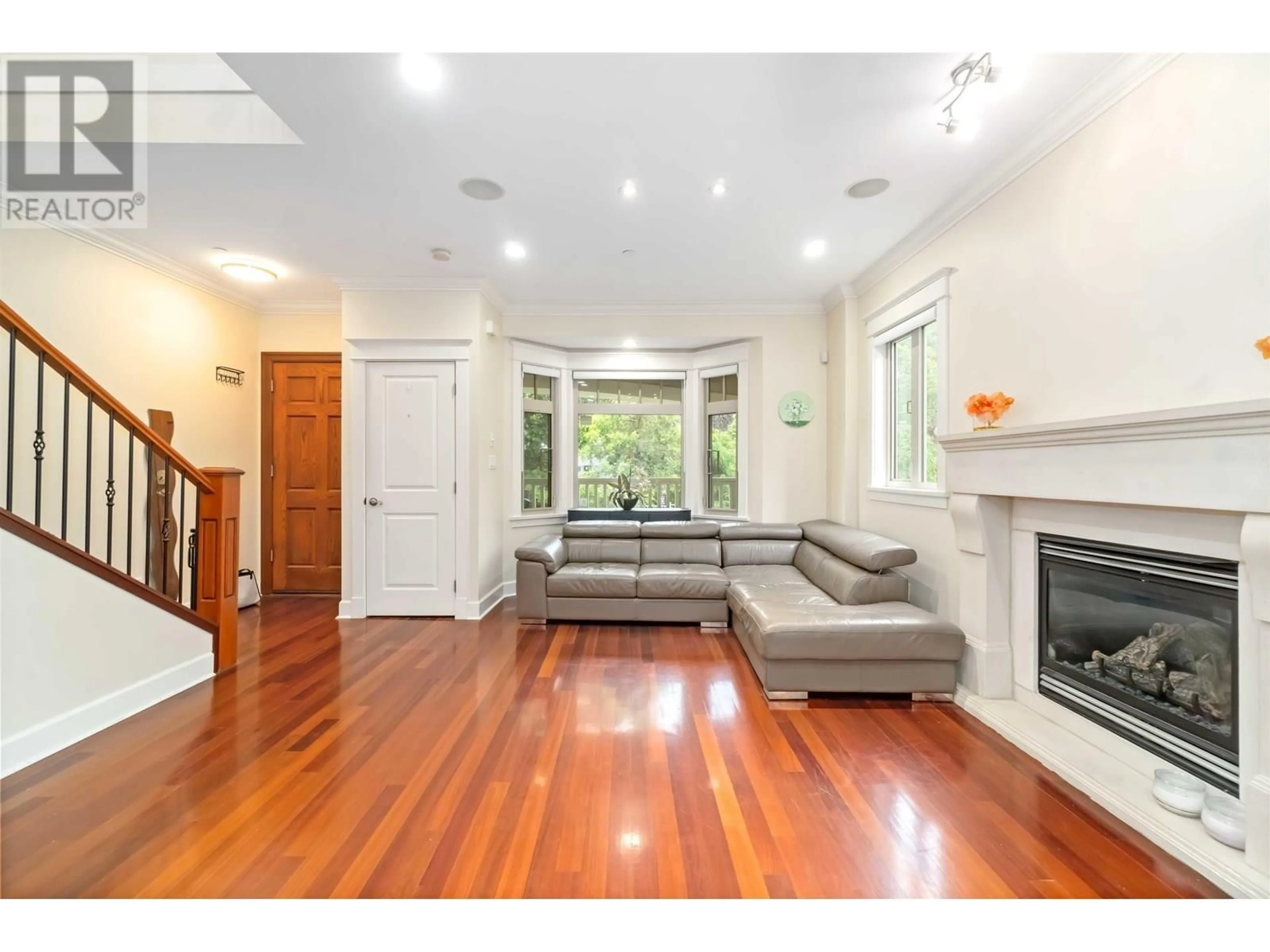 Living room with furniture, wood/laminate floor for 2506 8TH AVENUE, Vancouver British Columbia V6K2B4