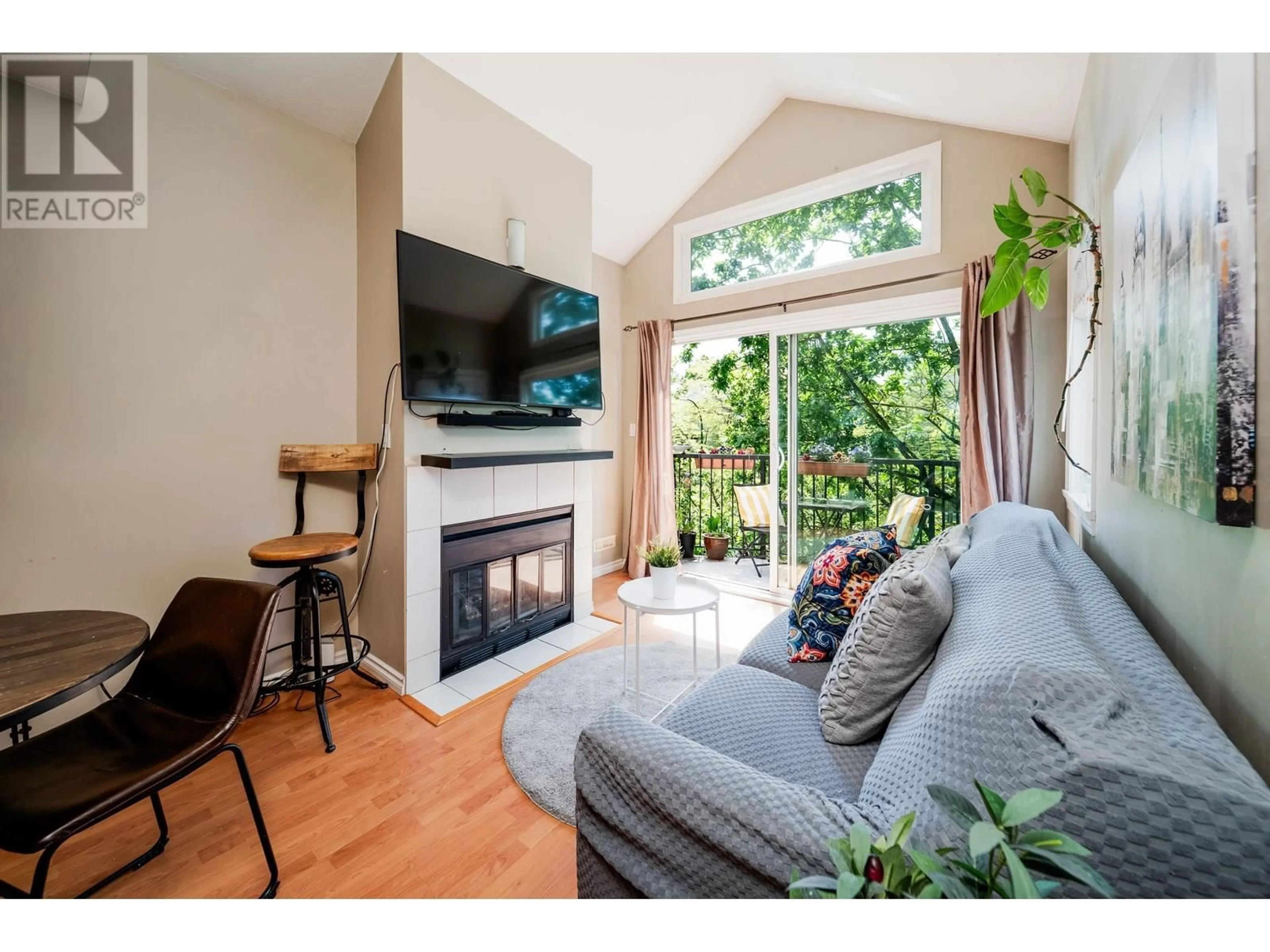 Living room with furniture, wood/laminate floor for 303 - 633 16TH AVENUE, Vancouver British Columbia V5Z1S5