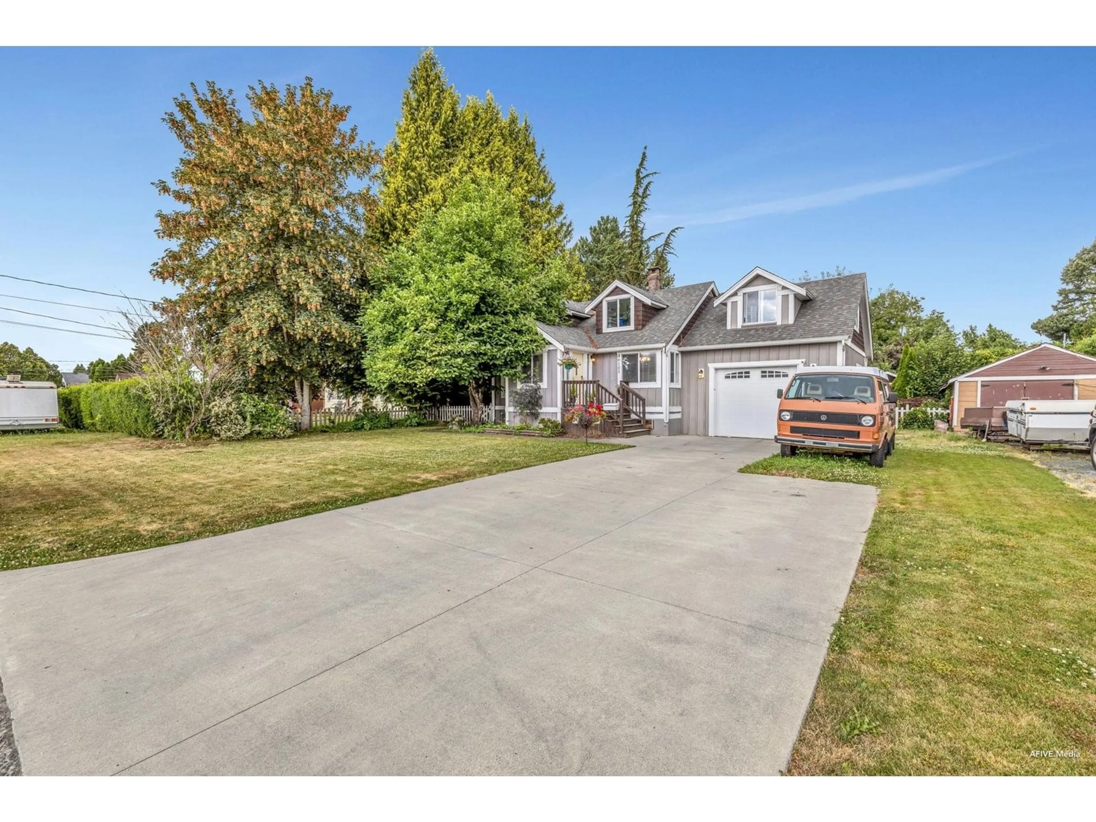 A pic from outside/outdoor area/front of a property/back of a property/a pic from drone, street for 46105 LEWIS AVENUE, Chilliwack British Columbia V2P3E2