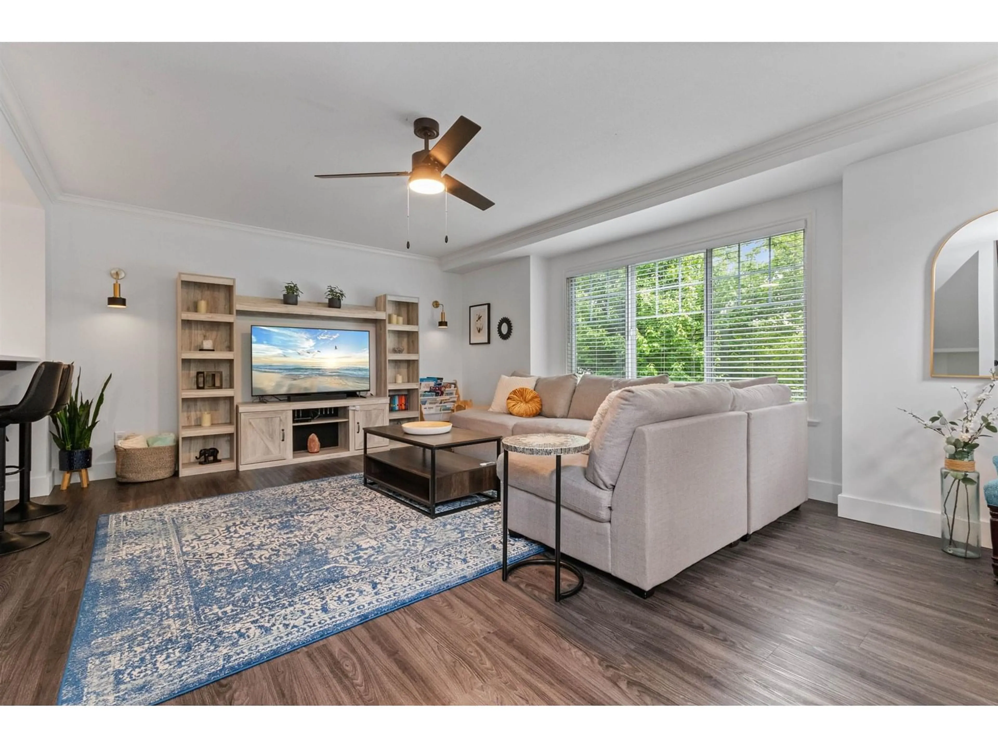 Living room with furniture, wood/laminate floor for 1 - 8825 ELM DRIVE, Chilliwack British Columbia V2P0A5