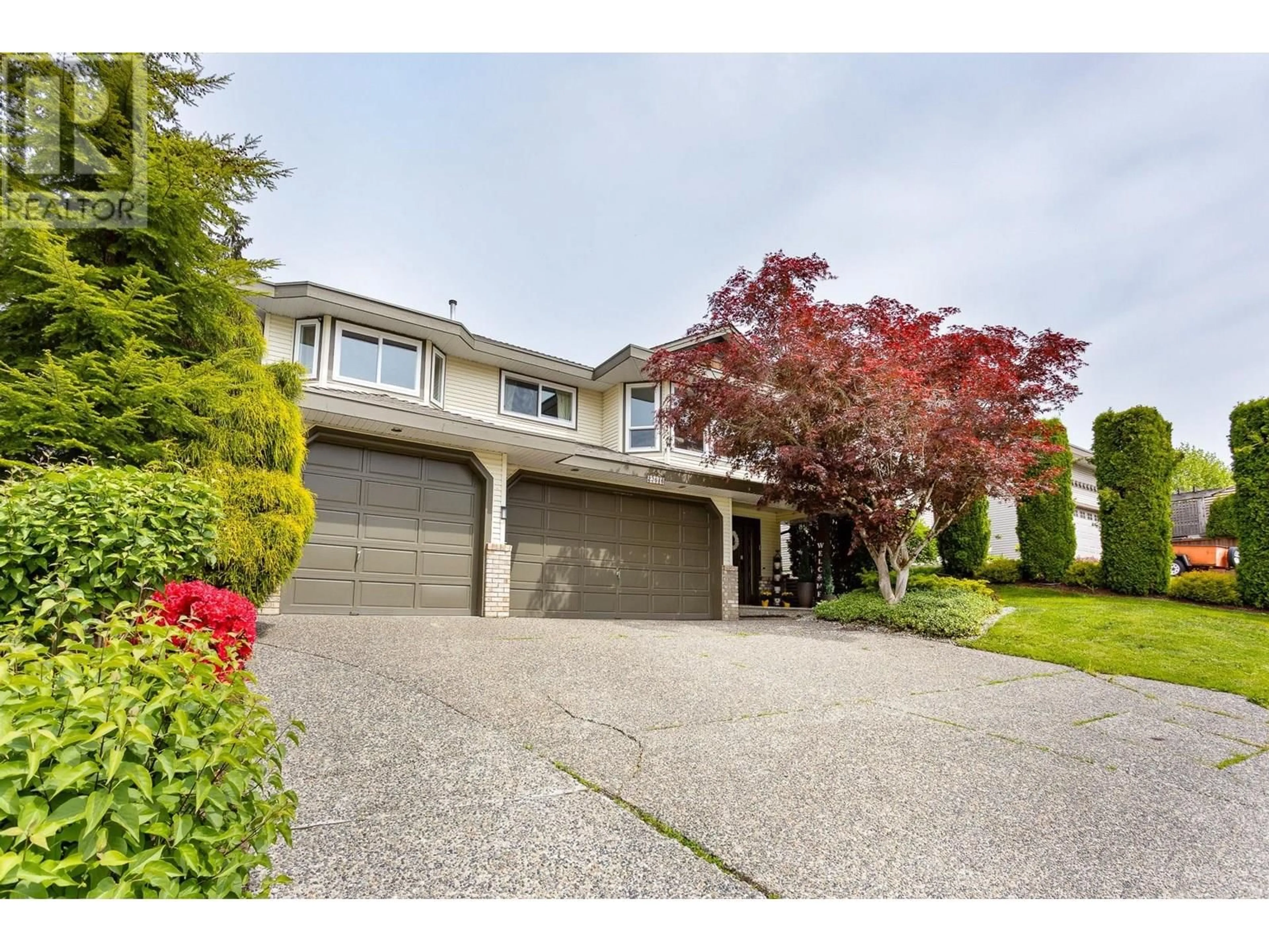 Home with vinyl exterior material, street for 23616 TAMARACK LANE, Maple Ridge British Columbia V2W1B3
