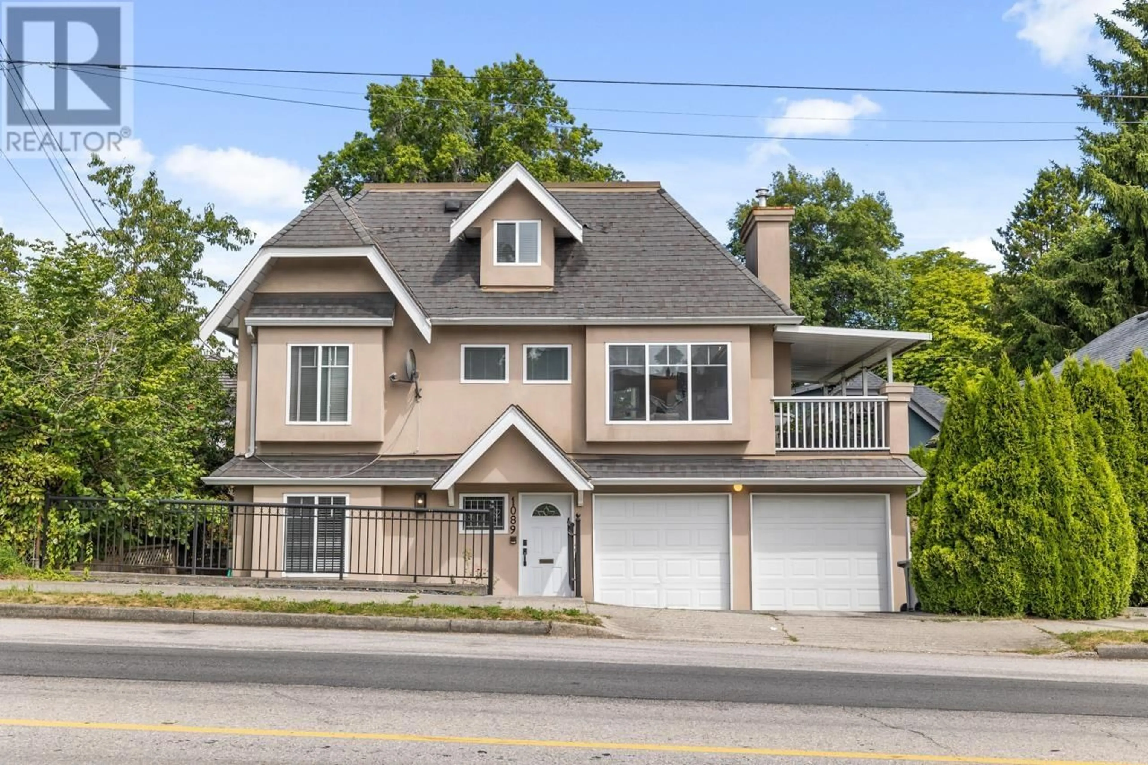 Home with vinyl exterior material, street for 1089 KING EDWARD AVENUE, Vancouver British Columbia V5V2E8