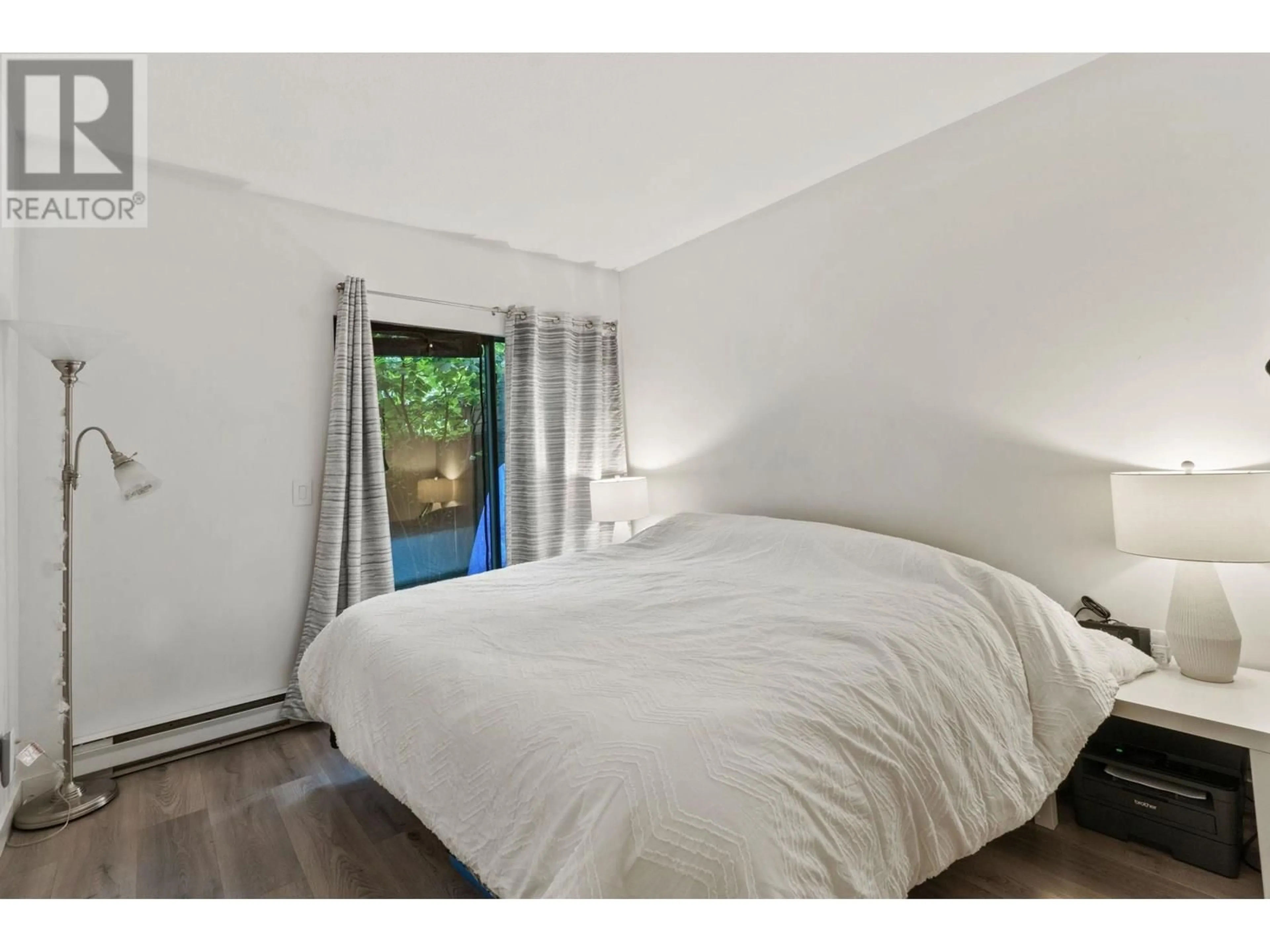 Bedroom with bed, wood/laminate floor for 23 - 2133 ST. GEORGES AVENUE, North Vancouver British Columbia V7L3K5