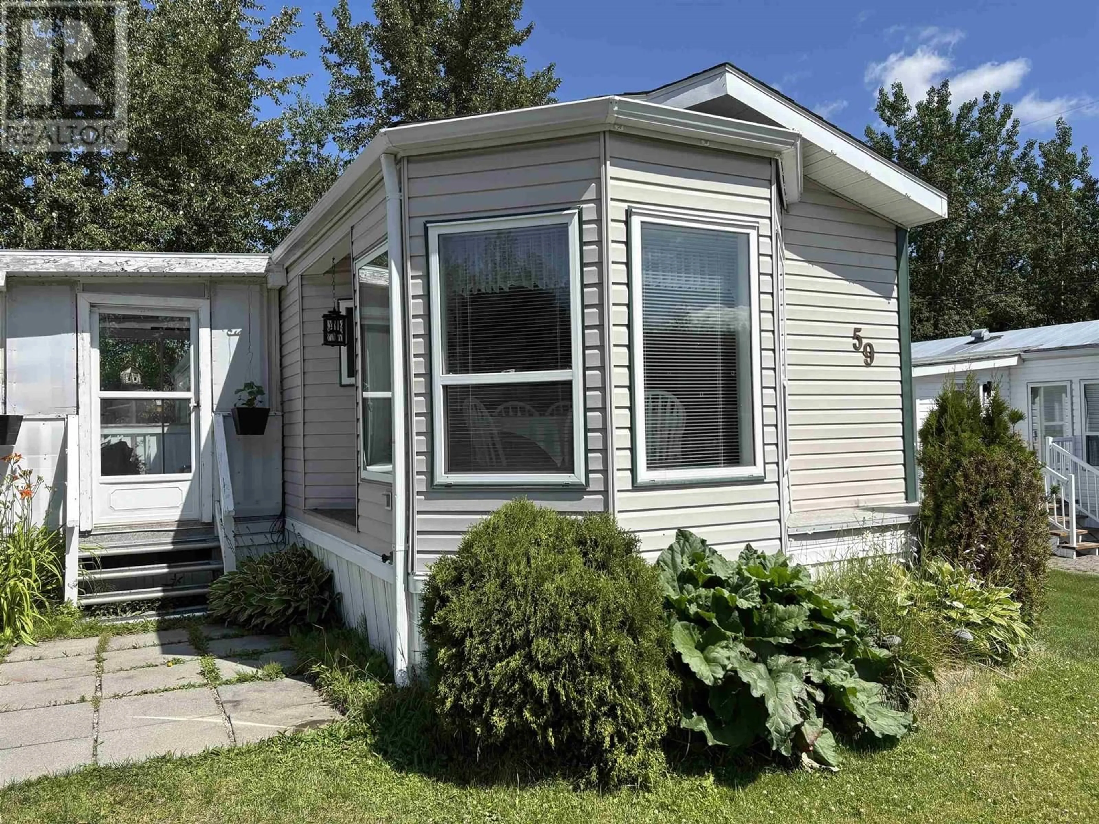 Home with vinyl exterior material, street for 59 - 1000 INVERNESS ROAD, Prince George British Columbia V2K4V1