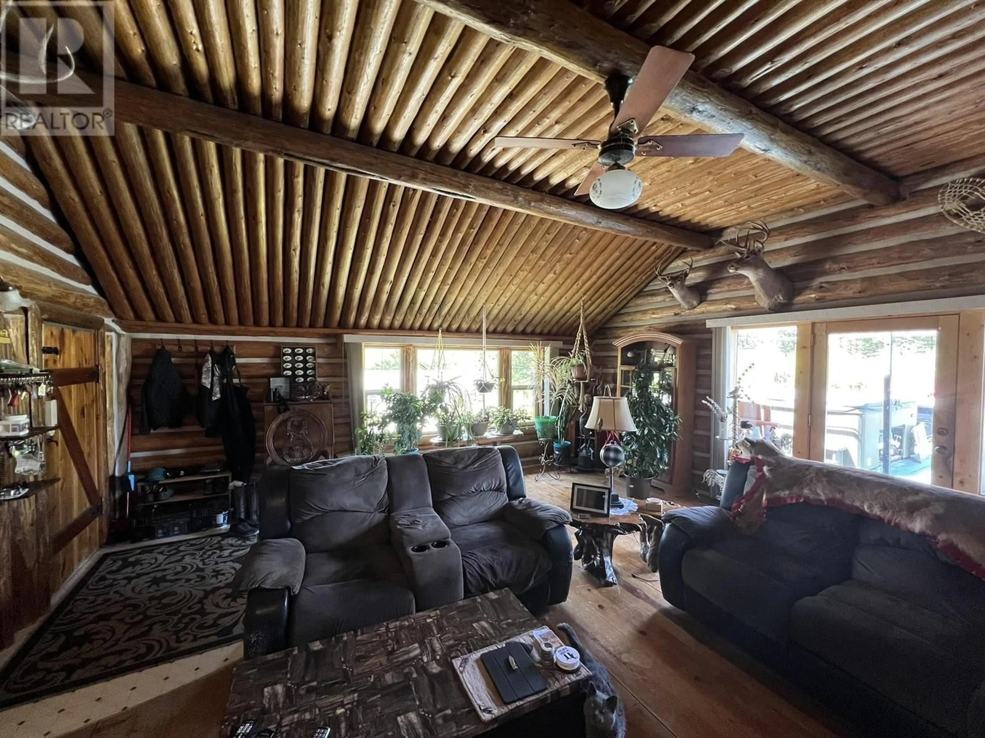 Living room with furniture, wood/laminate floor for 6273 MOOSE POINT DRIVE, Lone Butte British Columbia V0K2K1