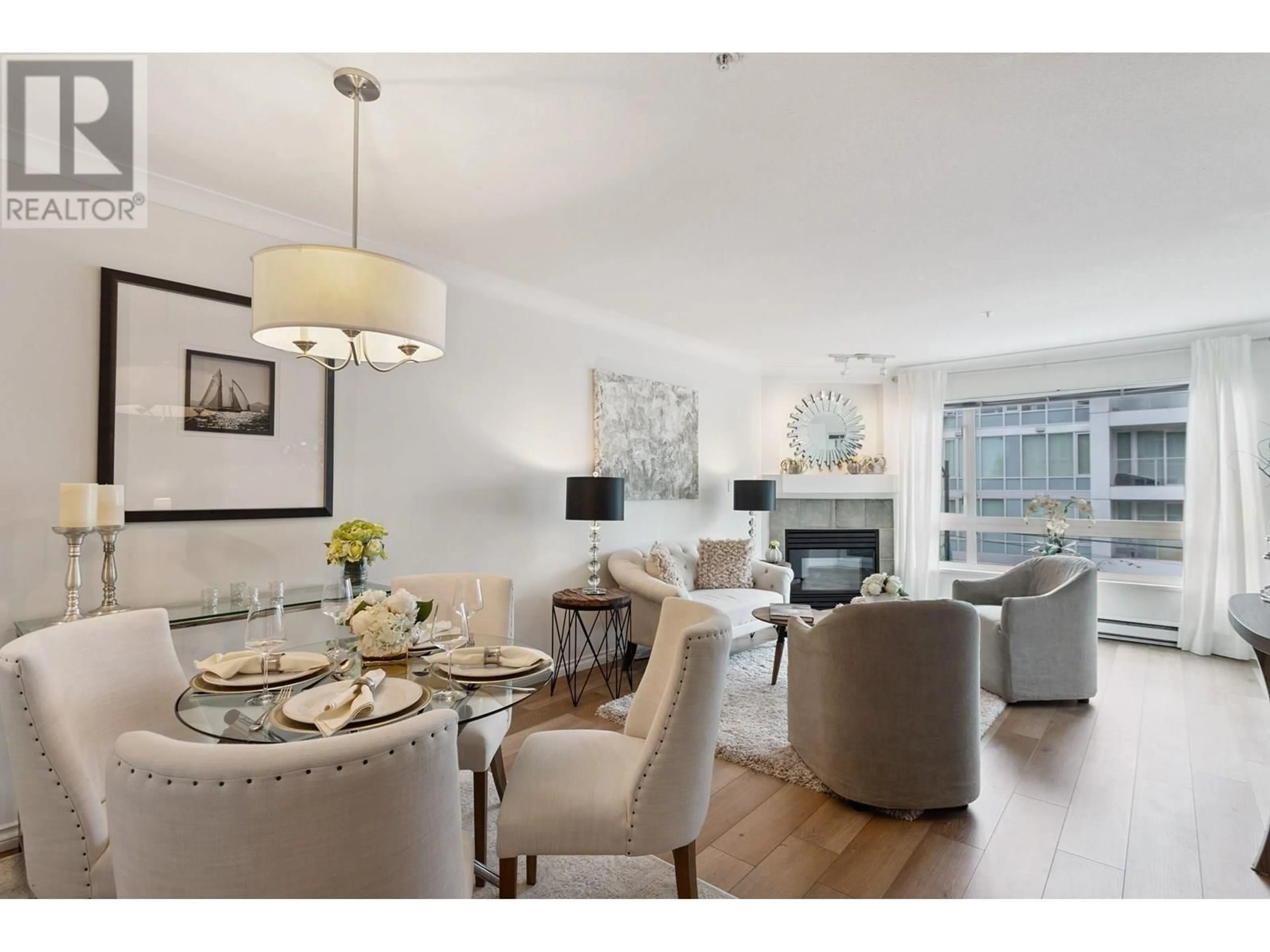 Living room with furniture, wood/laminate floor for 305 - 3590 26TH AVENUE, Vancouver British Columbia V6S1N9