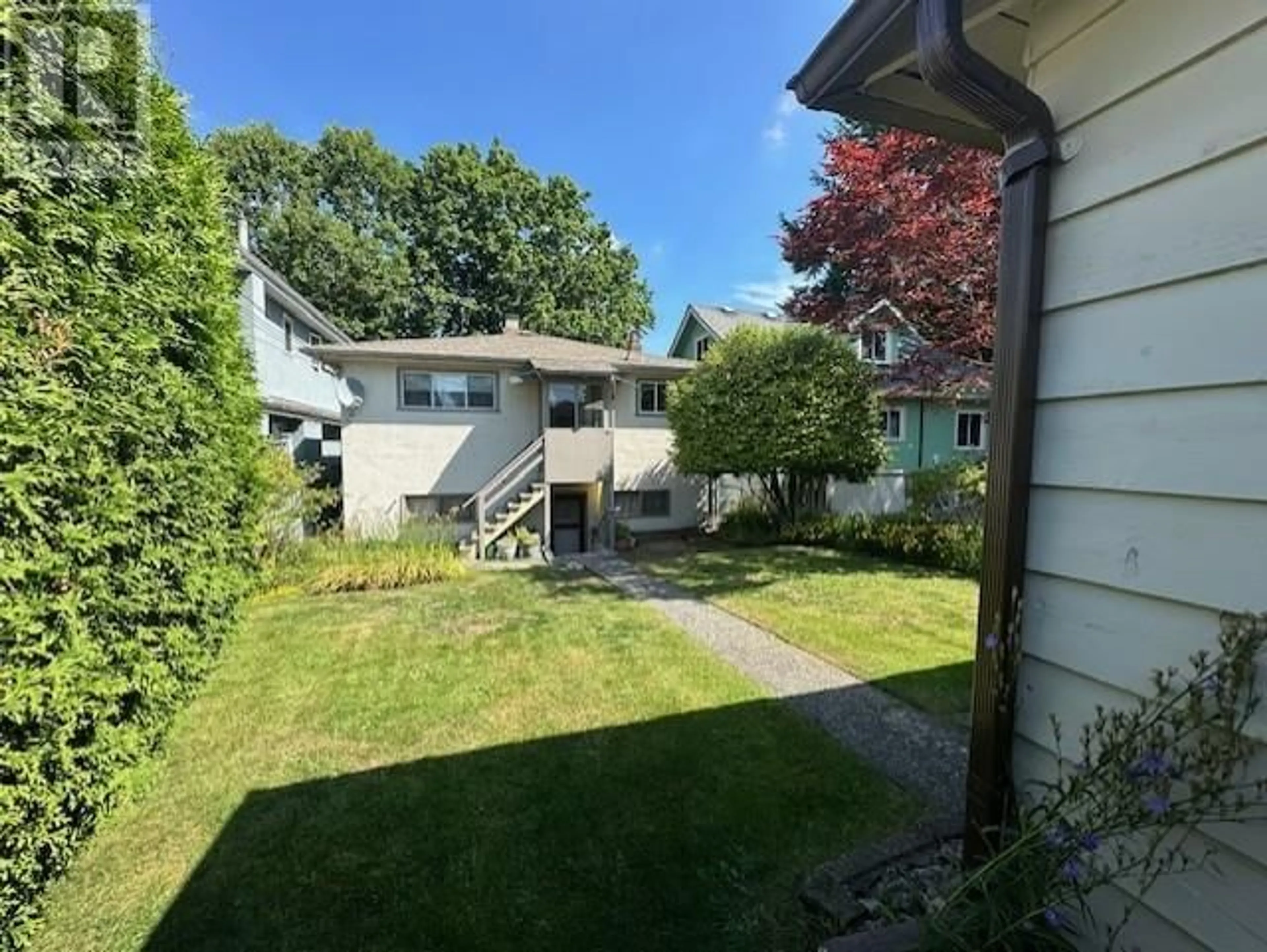 A pic from outside/outdoor area/front of a property/back of a property/a pic from drone, street for 3486 22ND AVENUE, Vancouver British Columbia V5M2Z4