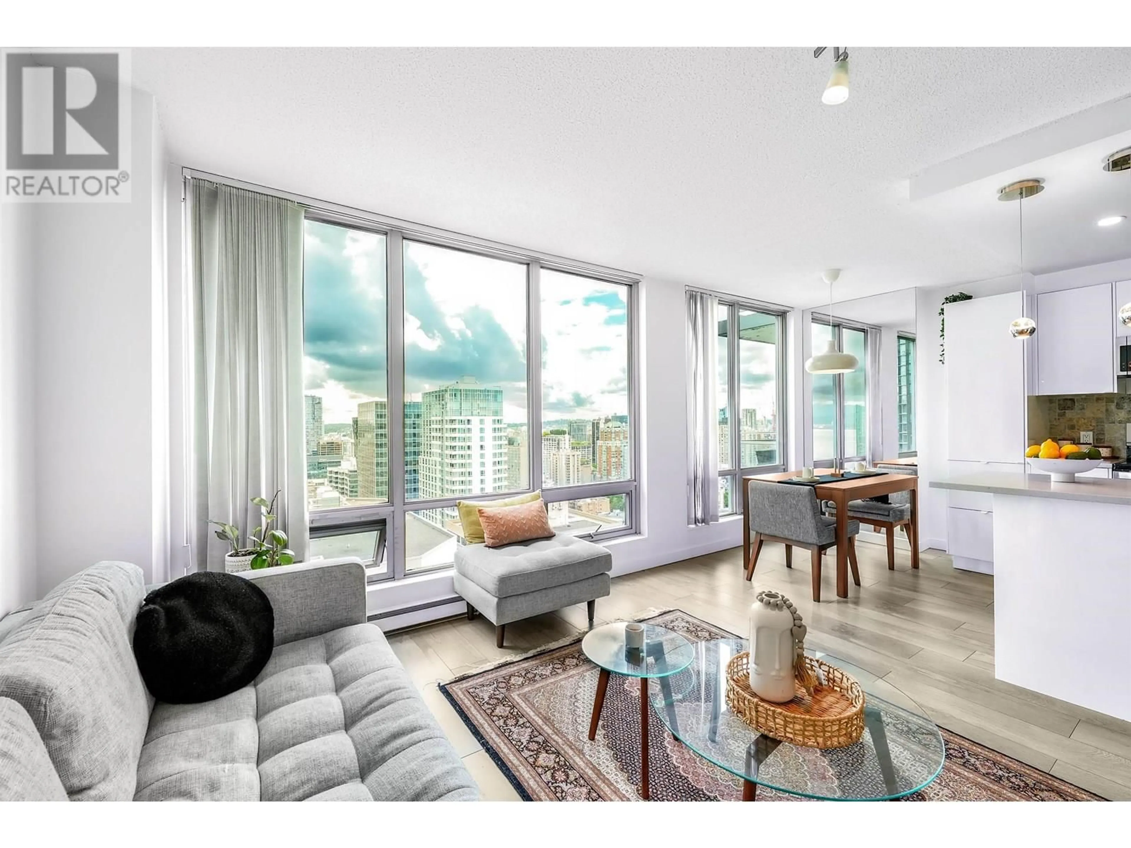 Living room with furniture, wood/laminate floor for 3304 - 1200 GEORGIA STREET, Vancouver British Columbia V6E4R2