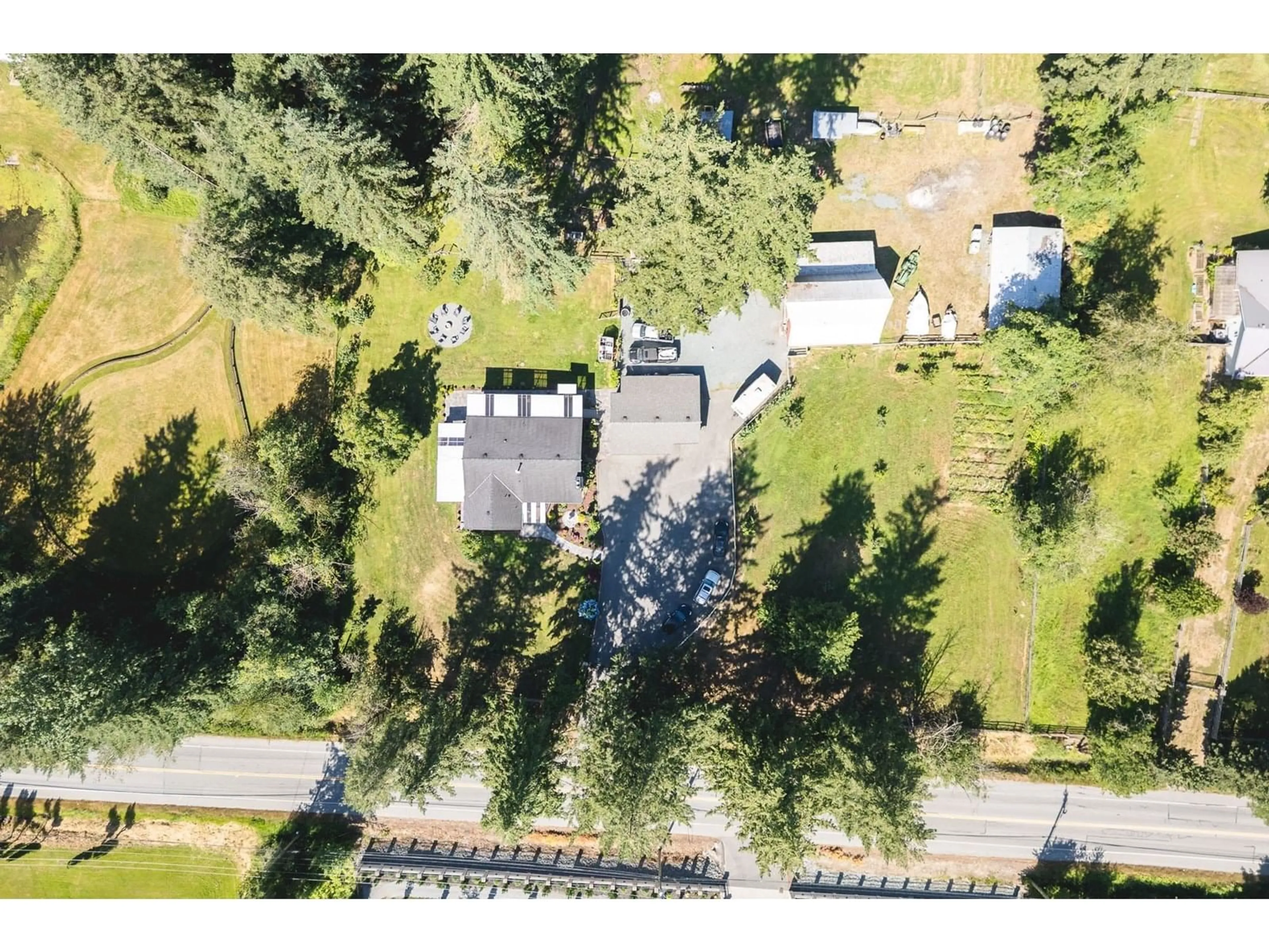 A pic from outside/outdoor area/front of a property/back of a property/a pic from drone, unknown for 5871 264, Langley British Columbia V4W1K7