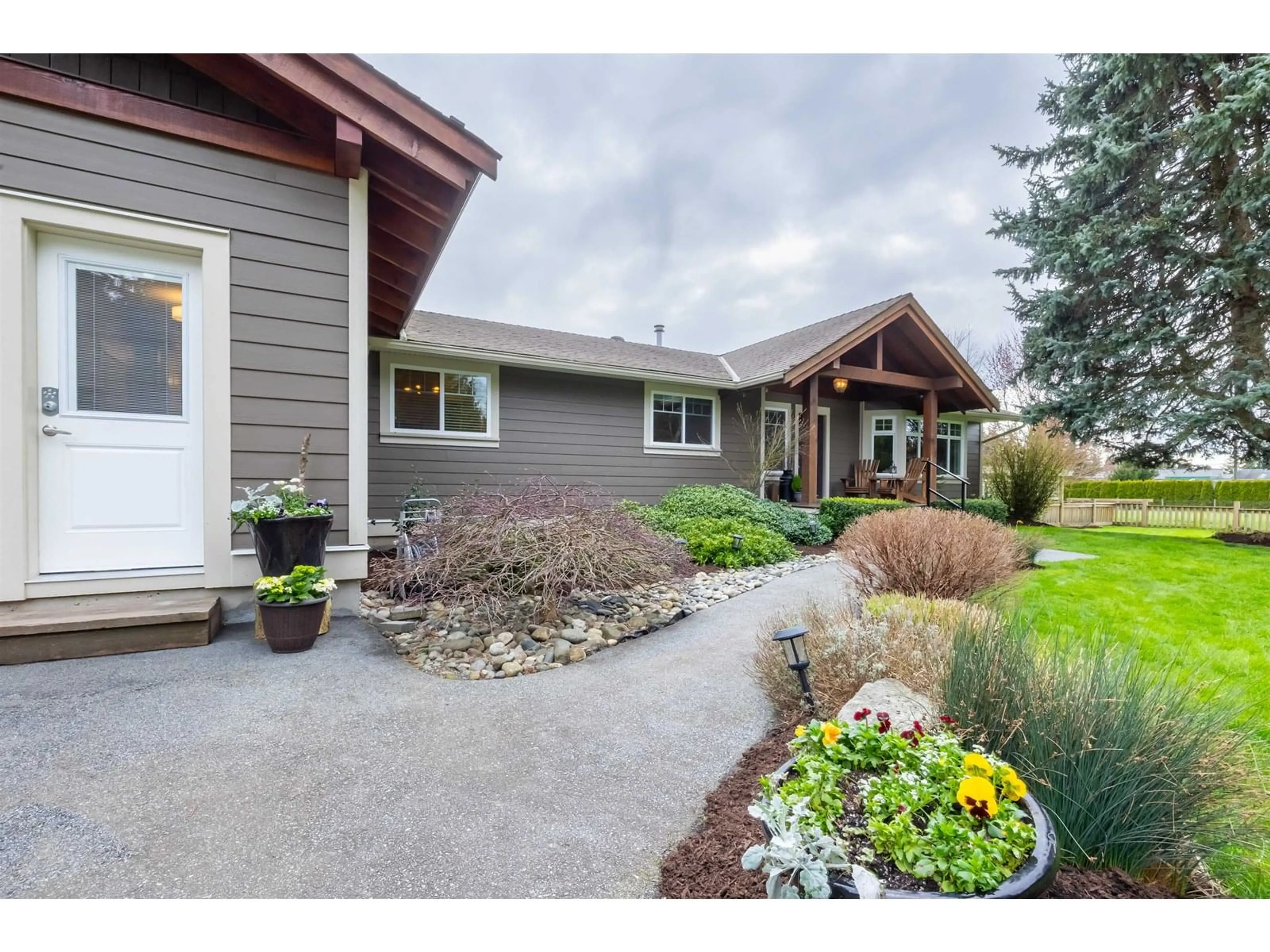 Home with vinyl exterior material, street for 23540 47, Langley British Columbia V2Z2S3
