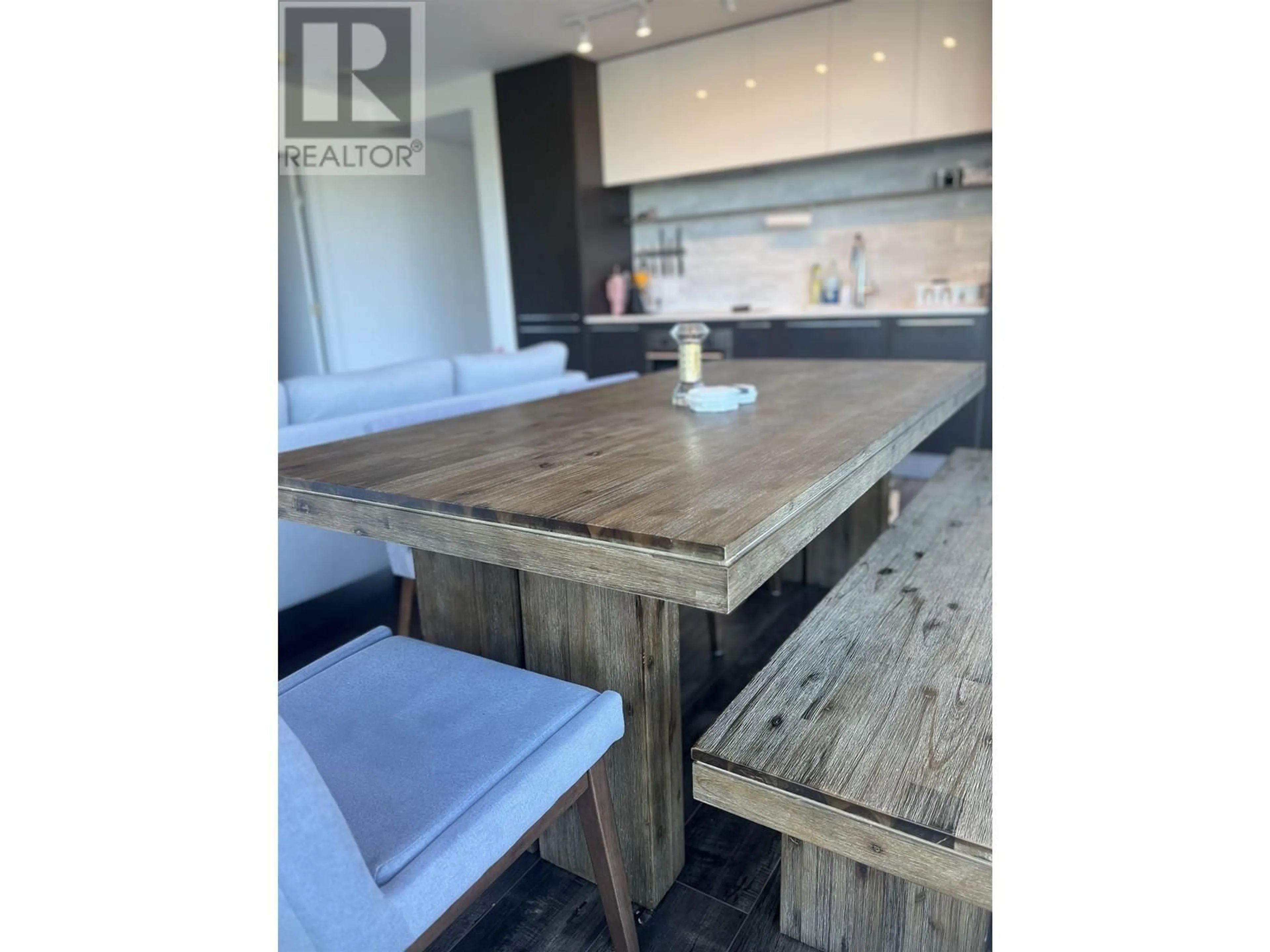 Open concept kitchen, wood/laminate floor for 302 - 8131 NUNAVUT LANE, Vancouver British Columbia V5X0E2
