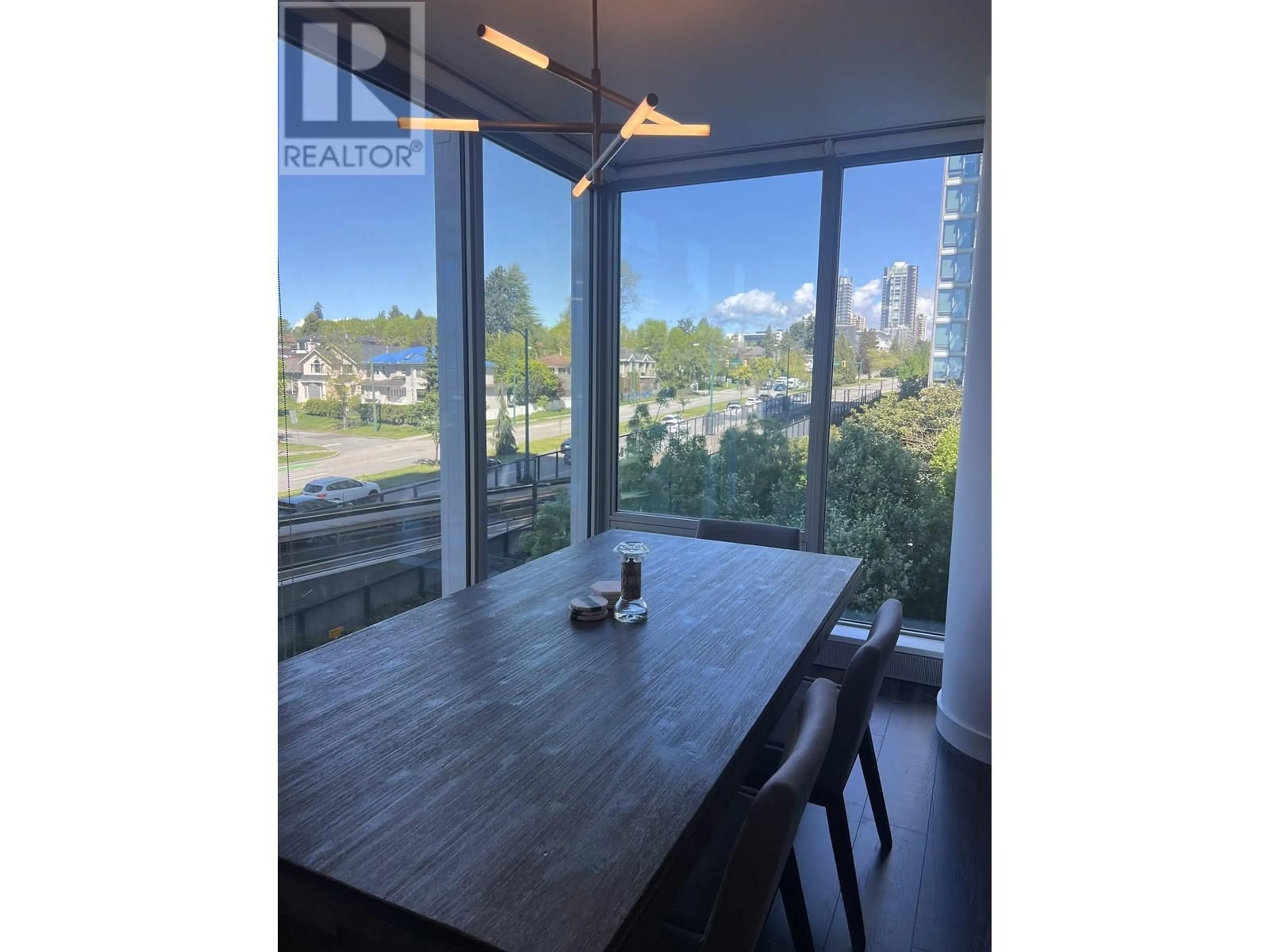 Dining room, wood/laminate floor for 302 - 8131 NUNAVUT LANE, Vancouver British Columbia V5X0E2