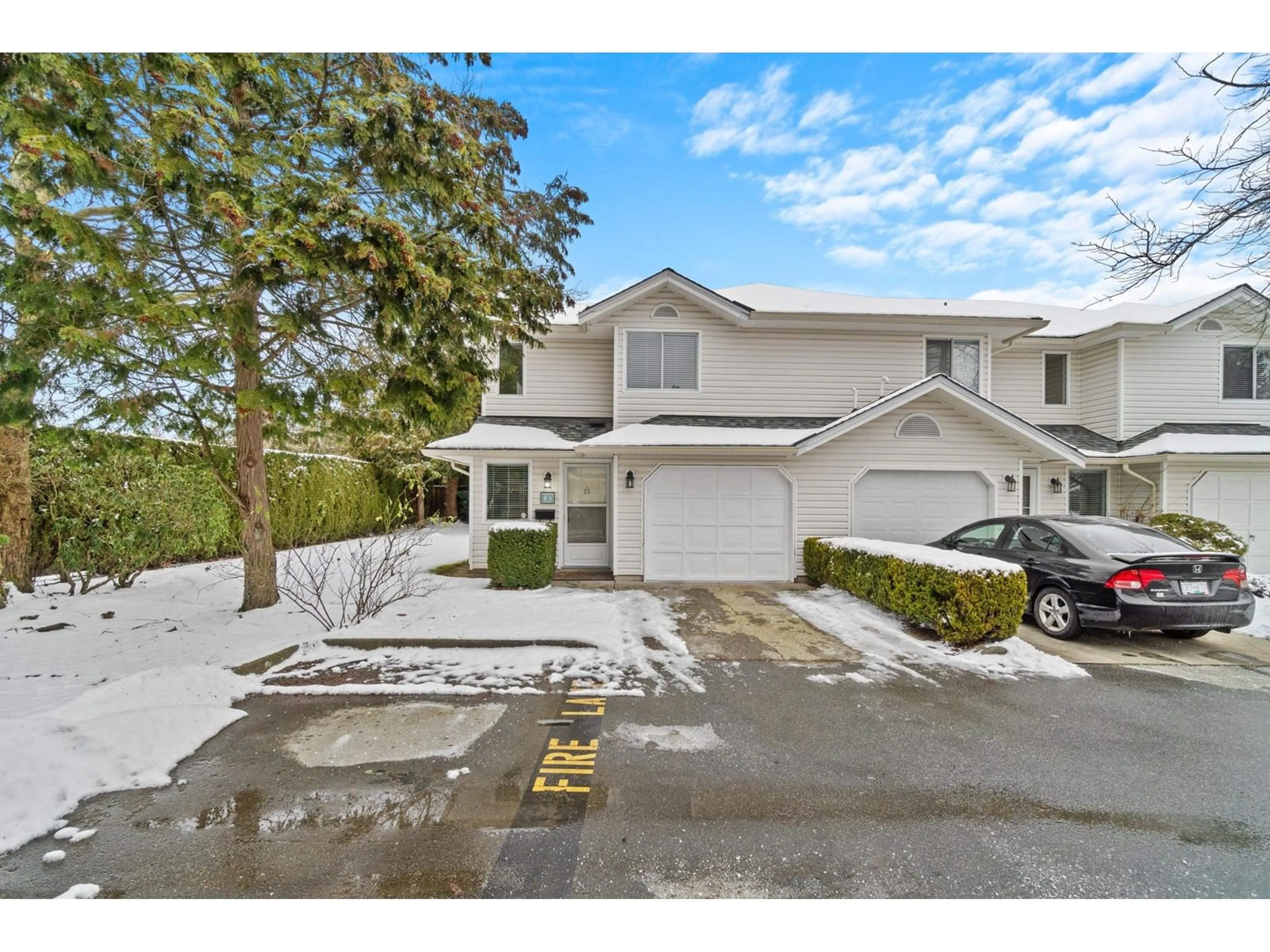 A pic from outside/outdoor area/front of a property/back of a property/a pic from drone, street for 28 - 10130 155, Surrey British Columbia V3R0R6