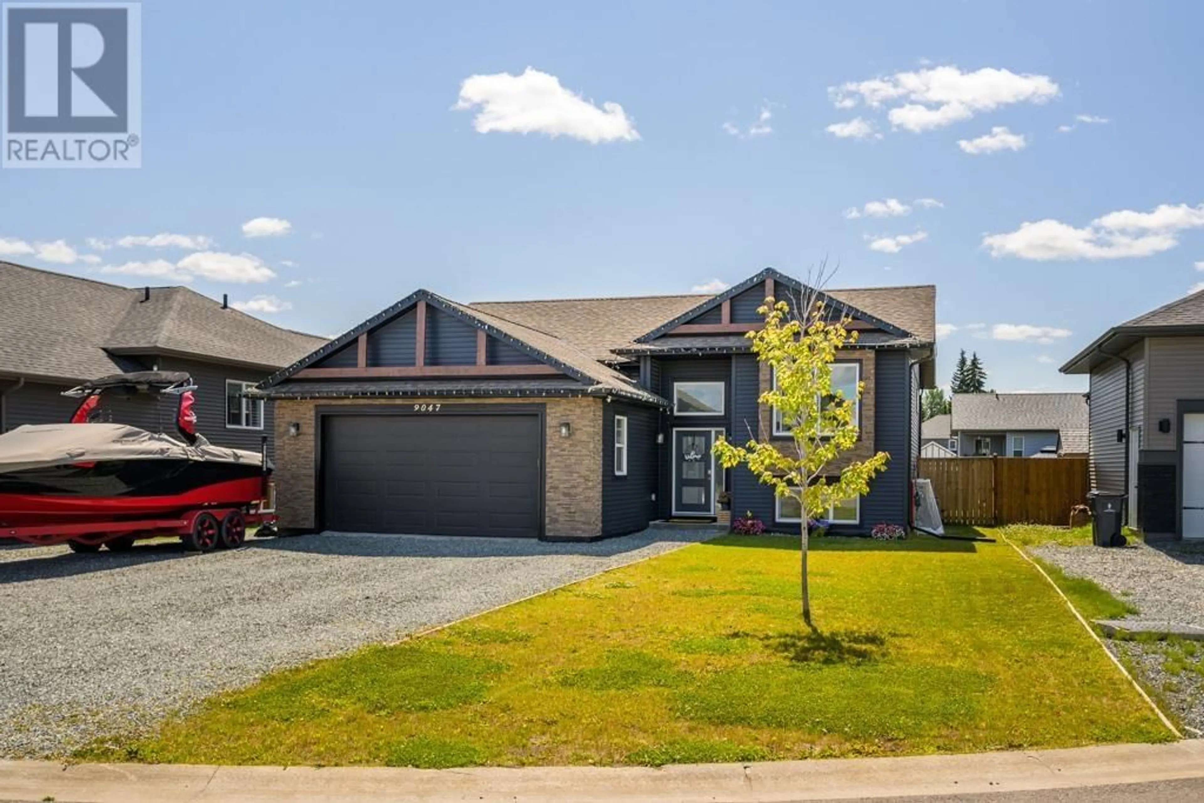 Home with brick exterior material, street for 9047 TATLOW PLACE, Prince George British Columbia V2K0B5