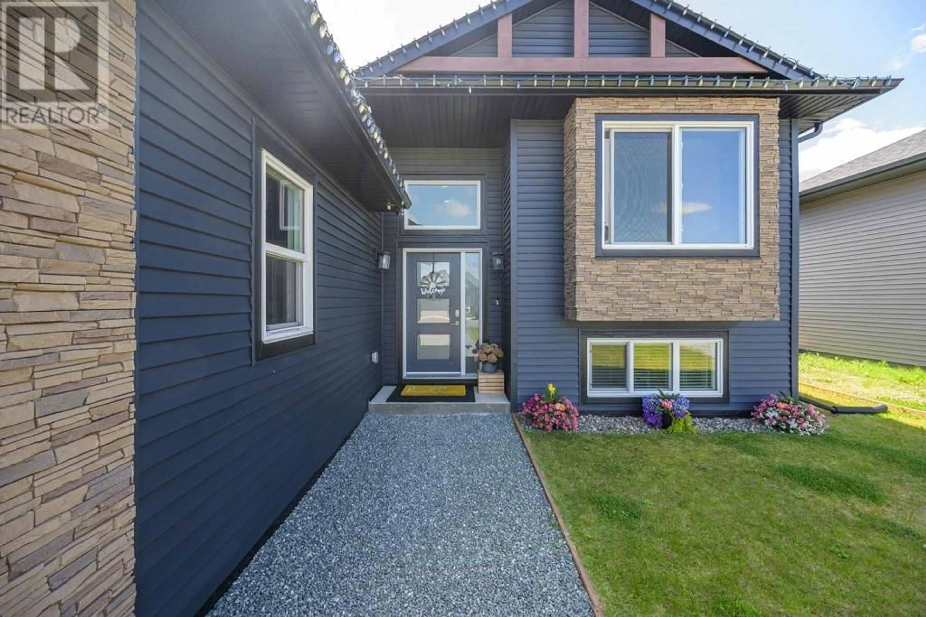 Home with vinyl exterior material, street for 9047 TATLOW PLACE, Prince George British Columbia V2K0B5