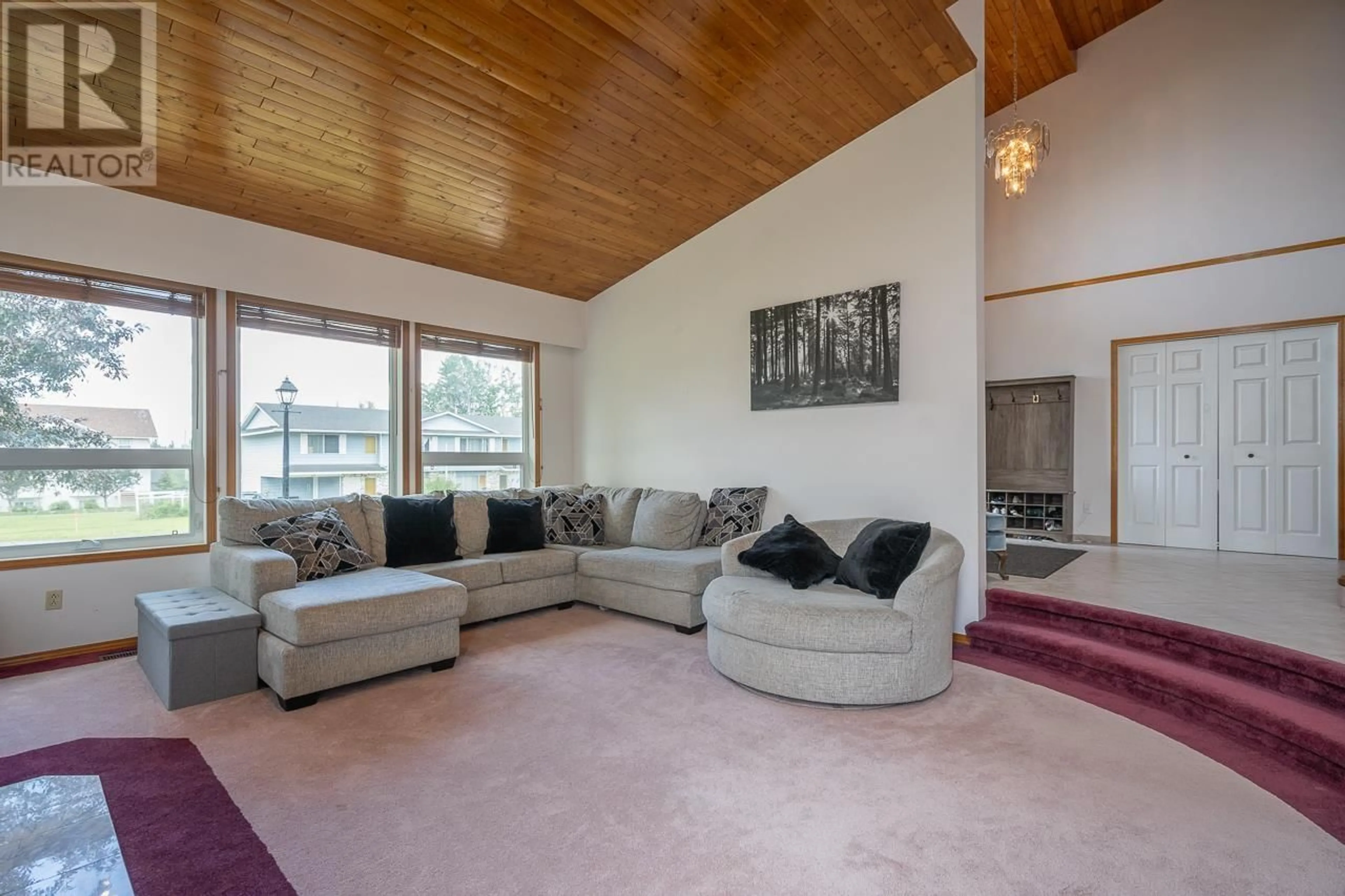 Living room with furniture, unknown for 803 CARIBOO TRAIL, 100 Mile House British Columbia V0K2E0