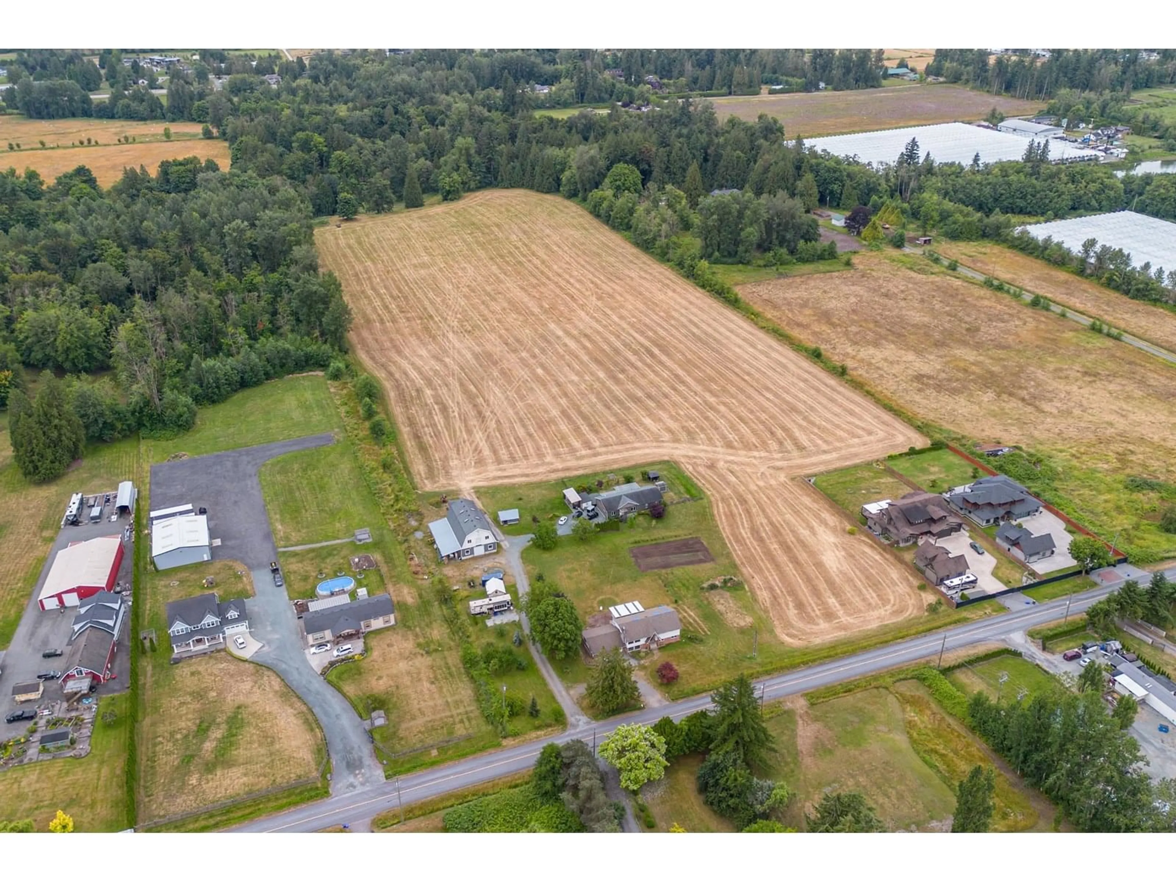 A pic from outside/outdoor area/front of a property/back of a property/a pic from drone, unknown for 21370 24, Langley British Columbia V2Z2A8